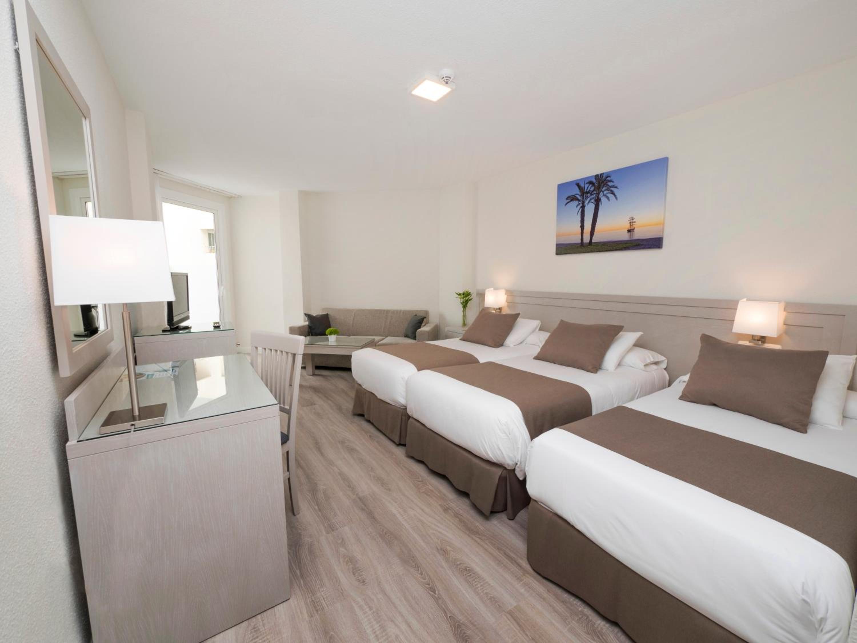 Triple Room (2 Adults + 1 Child) - Photo 1