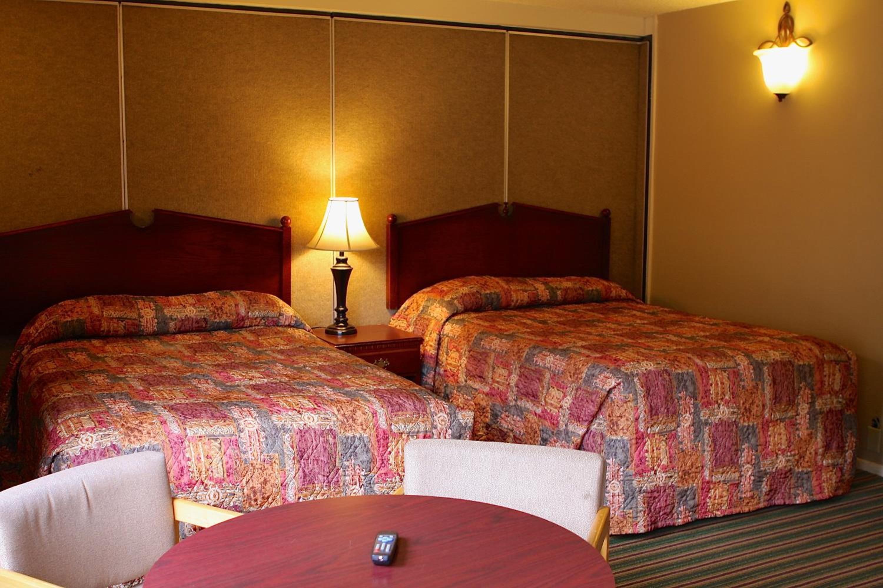 One Queen Bed and Two Full Beds  - Photo 3