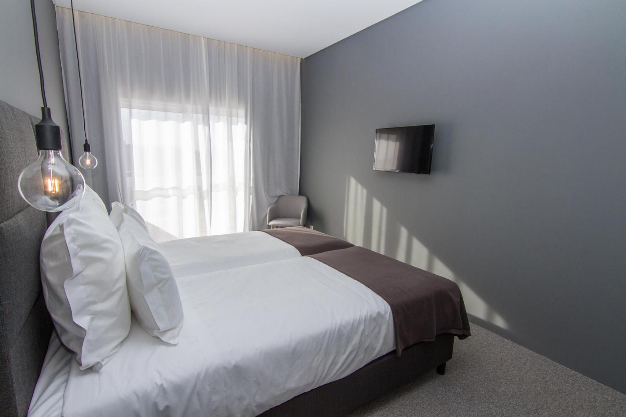 Deluxe Room with Balcony and Pool View