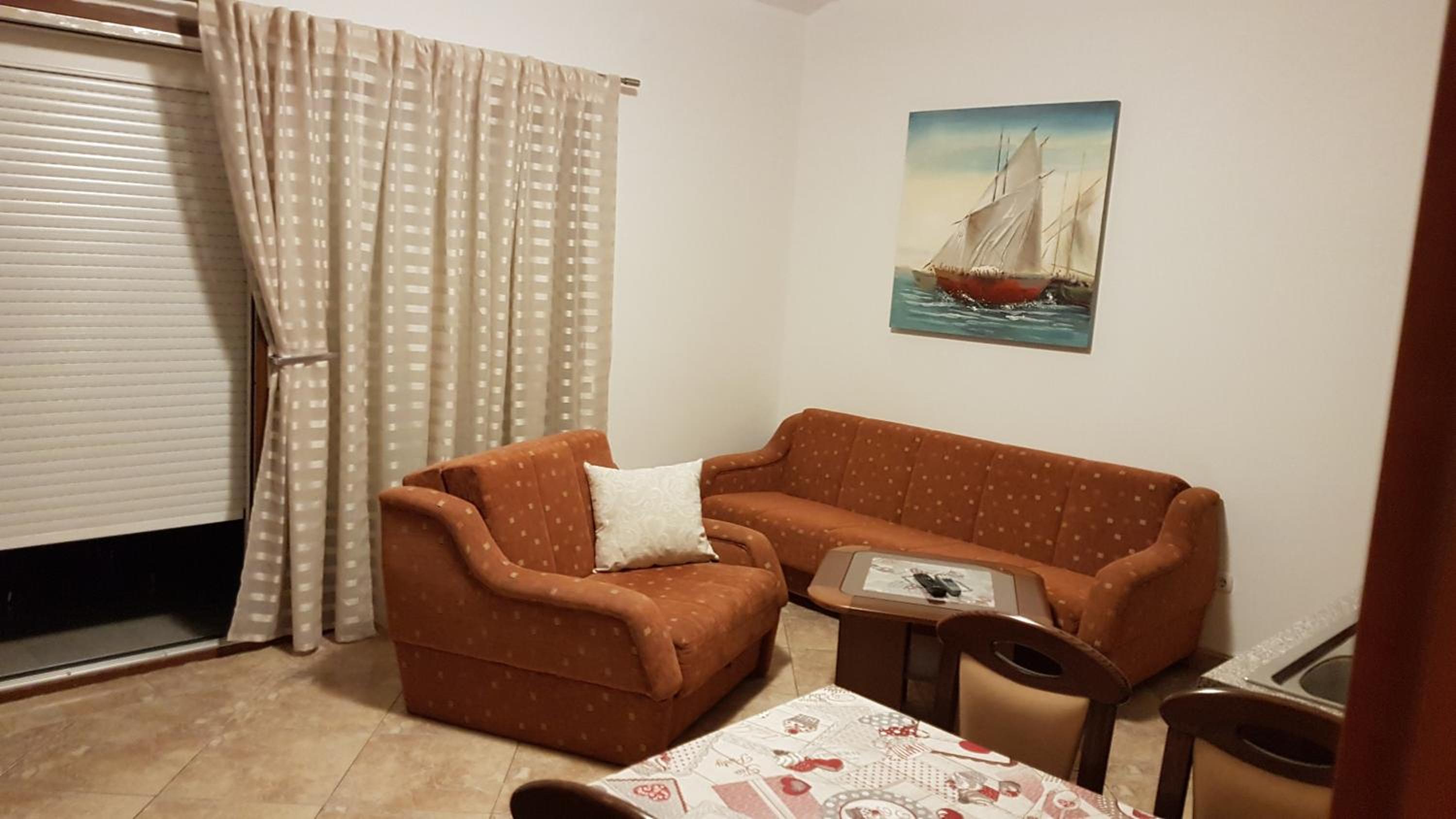 One-Bedroom Apartment with Balcony and Sea View