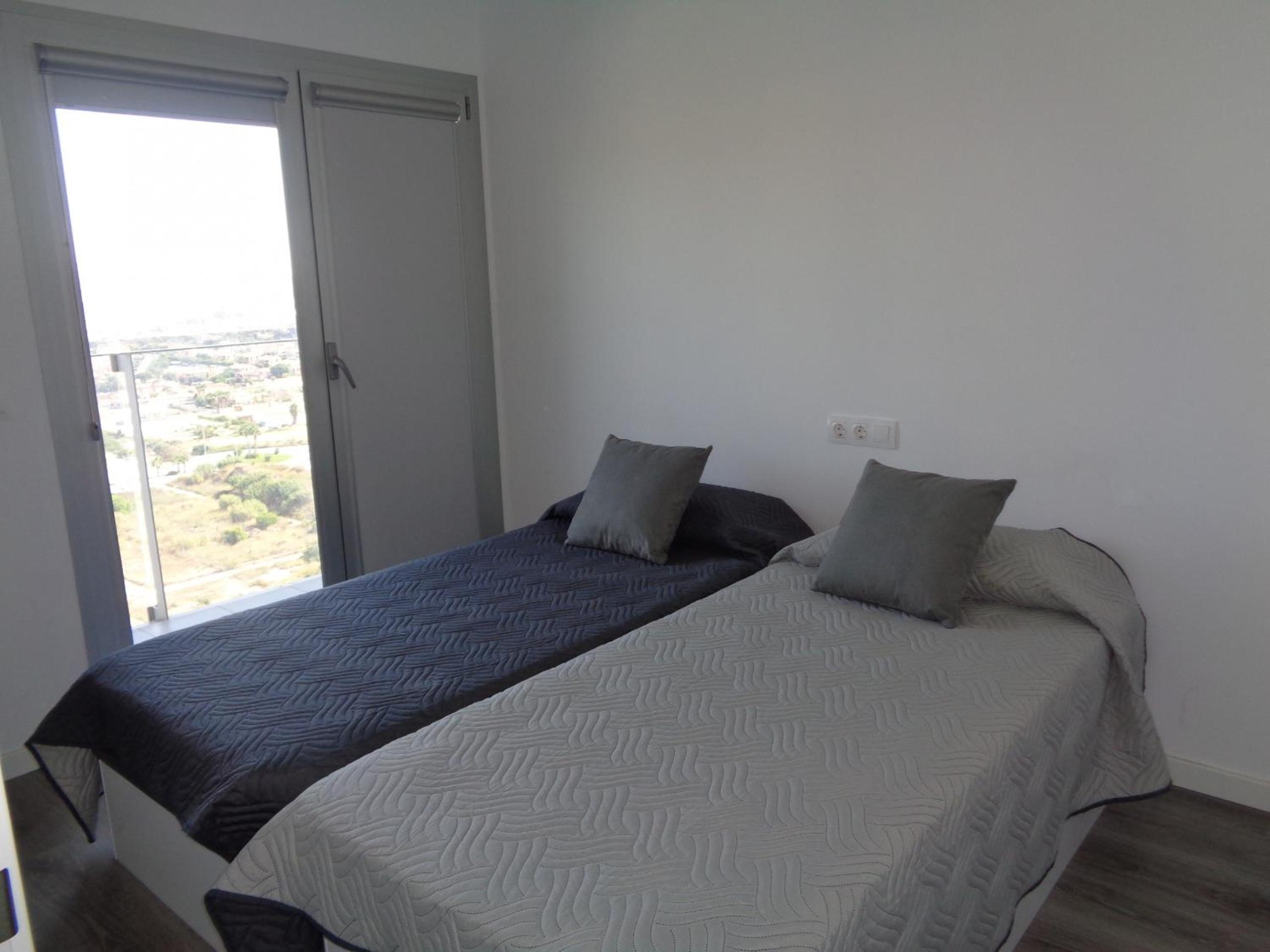 Three-Bedroom Apartment photo 1