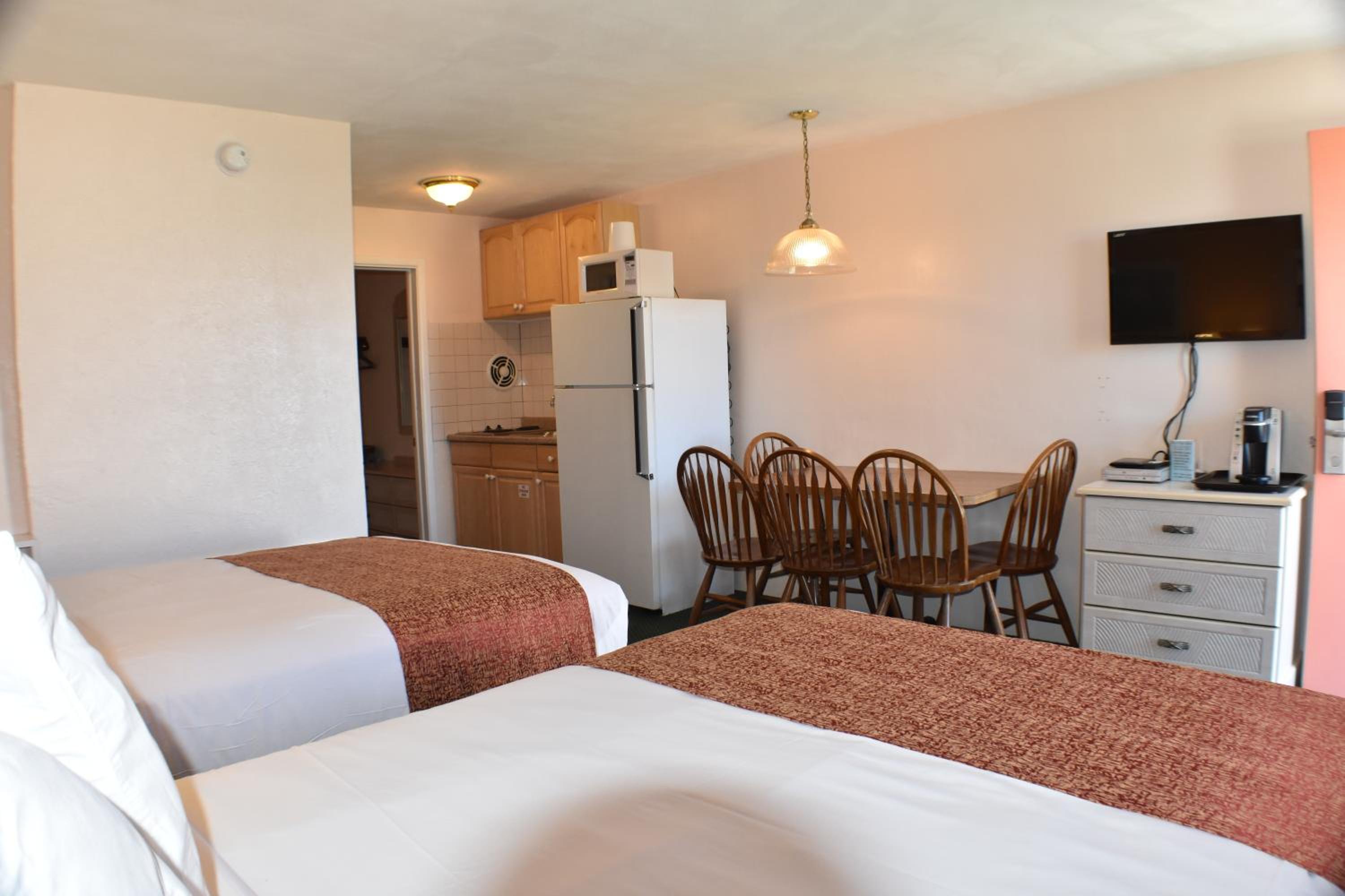 Two room Suite with Three full beds and Kitchenette photo 1