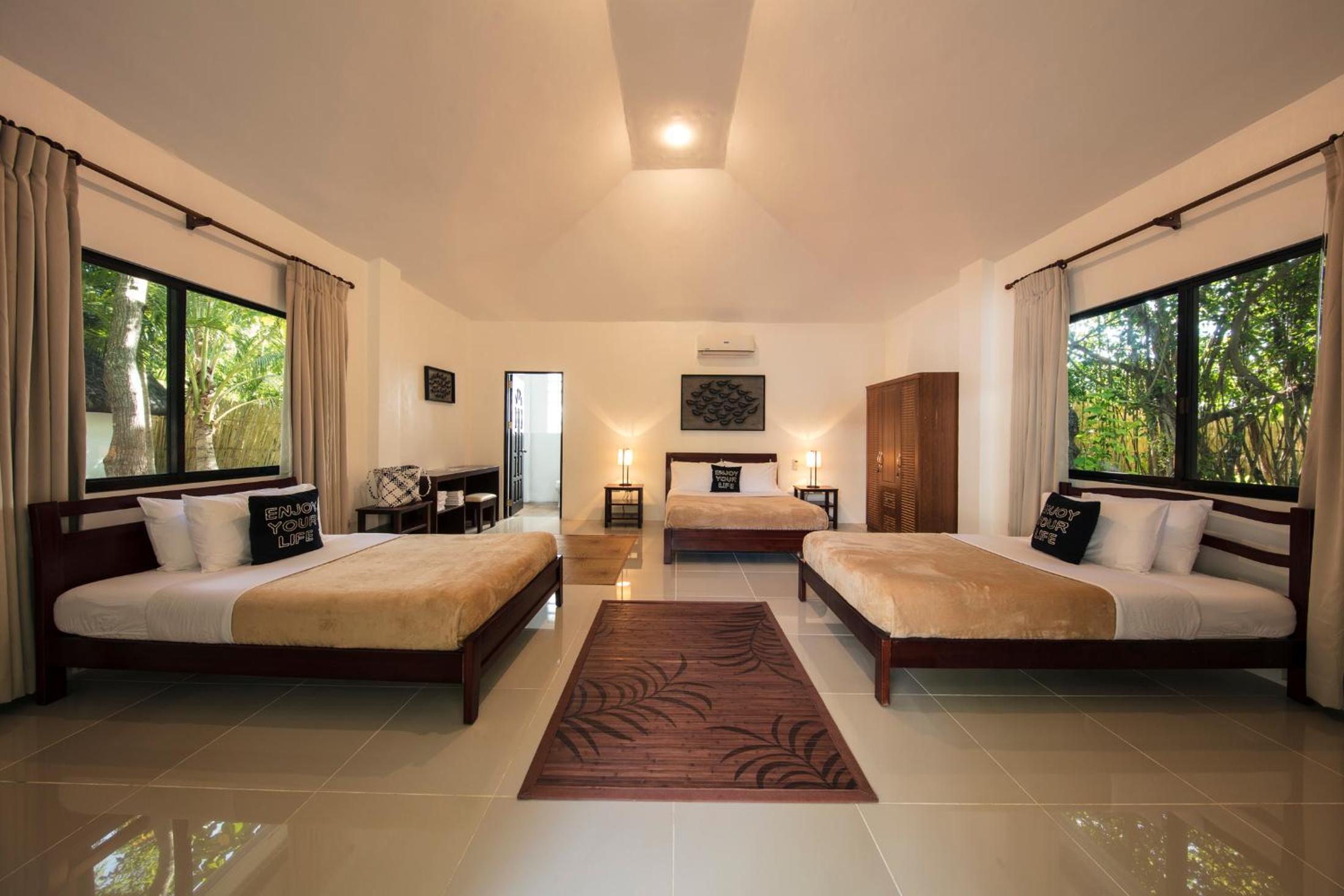 Deluxe Triple Room - Photo 1