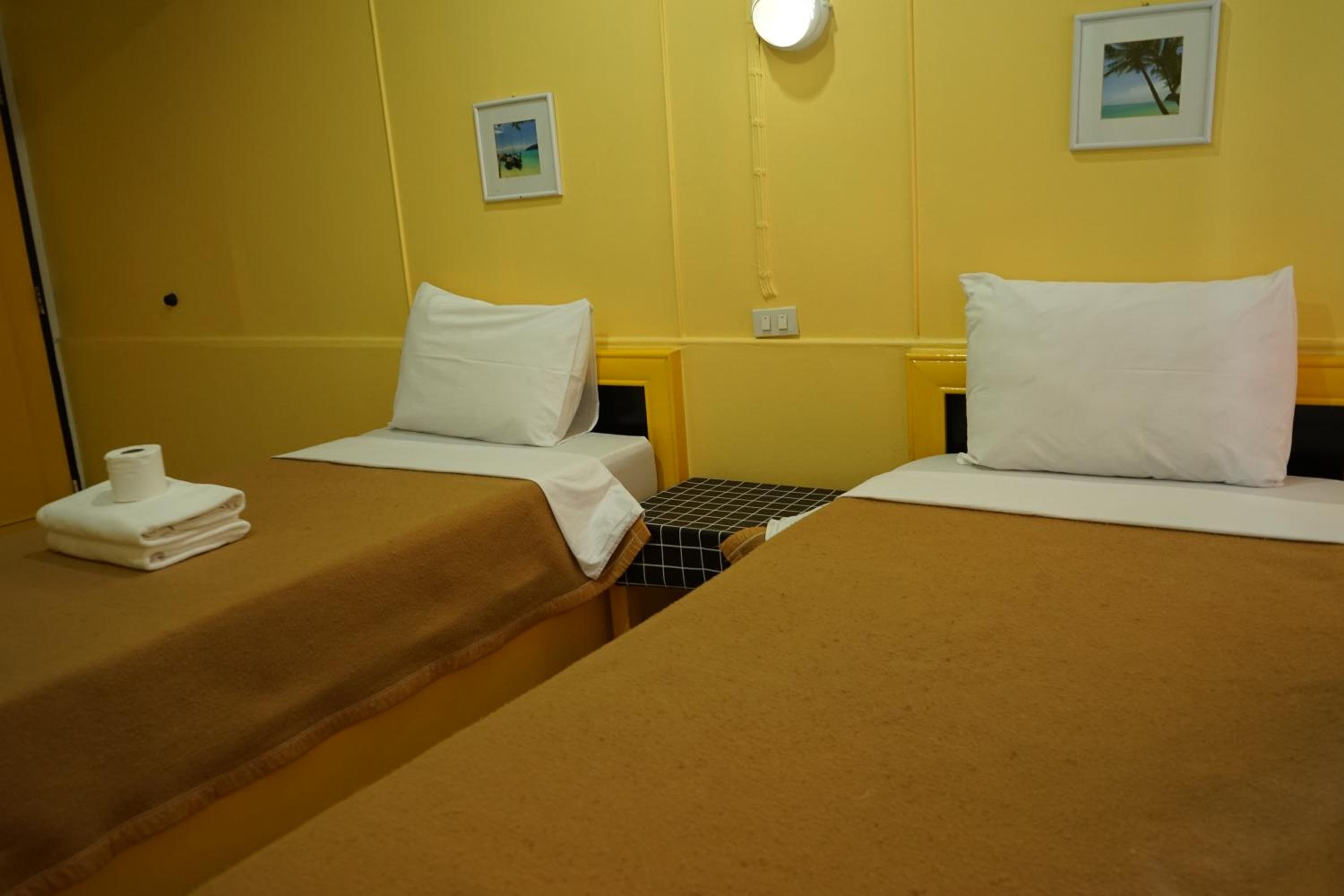 Basic Triple Room with Shared Bathroom photo 1