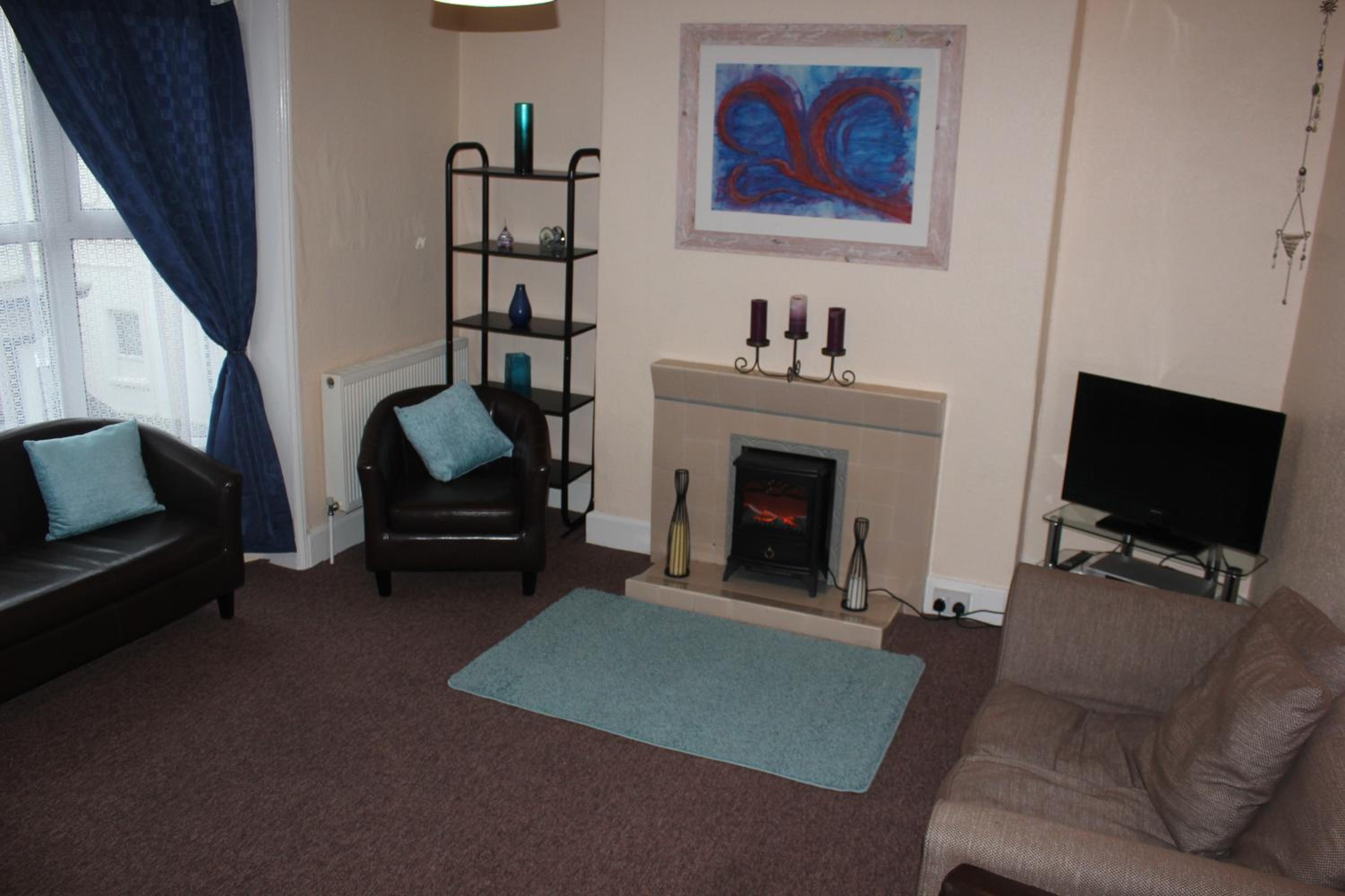 Three-Bedroom Apartment photo 1