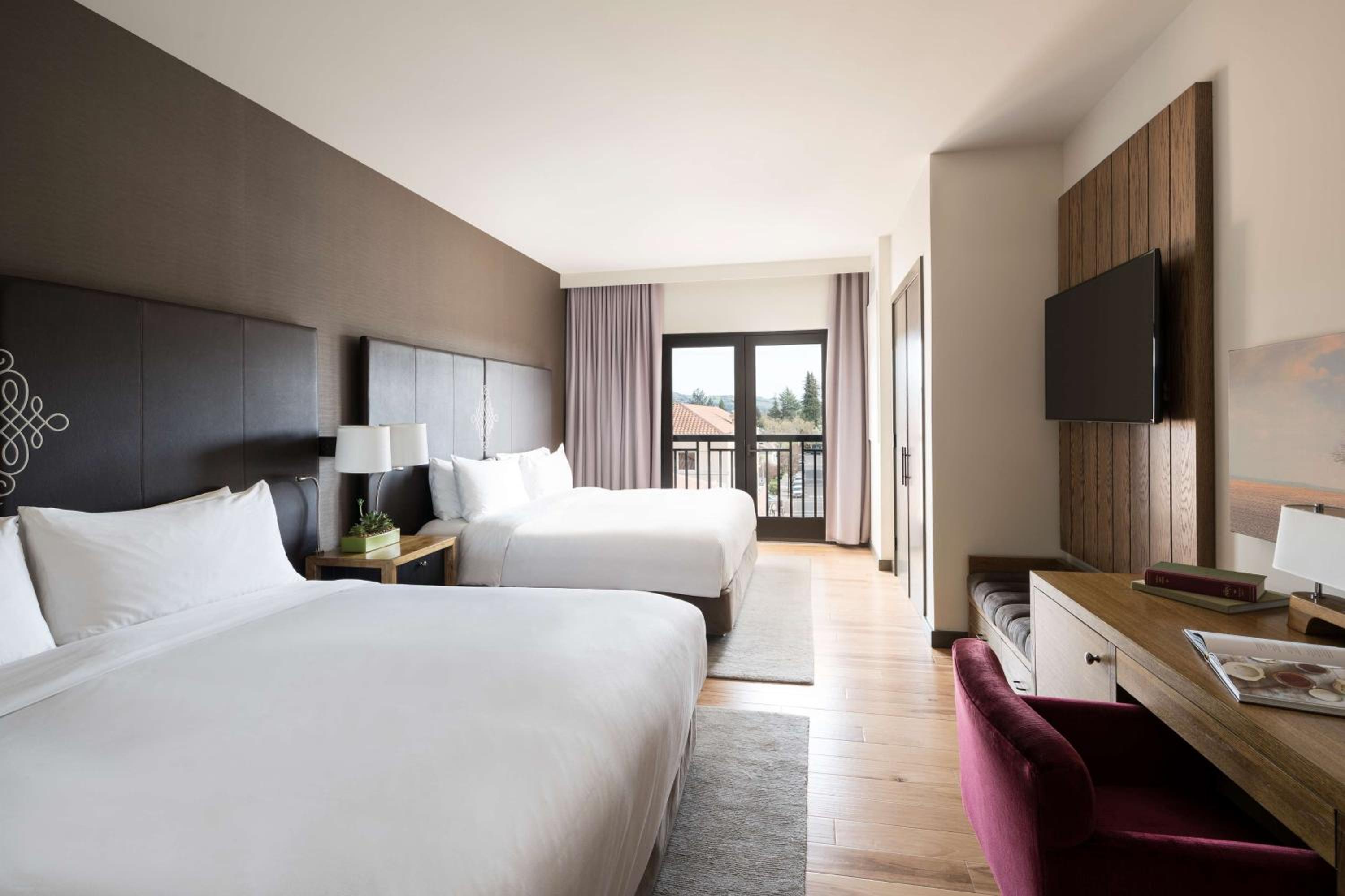 Deluxe King Room with Two King Beds - Photo 1