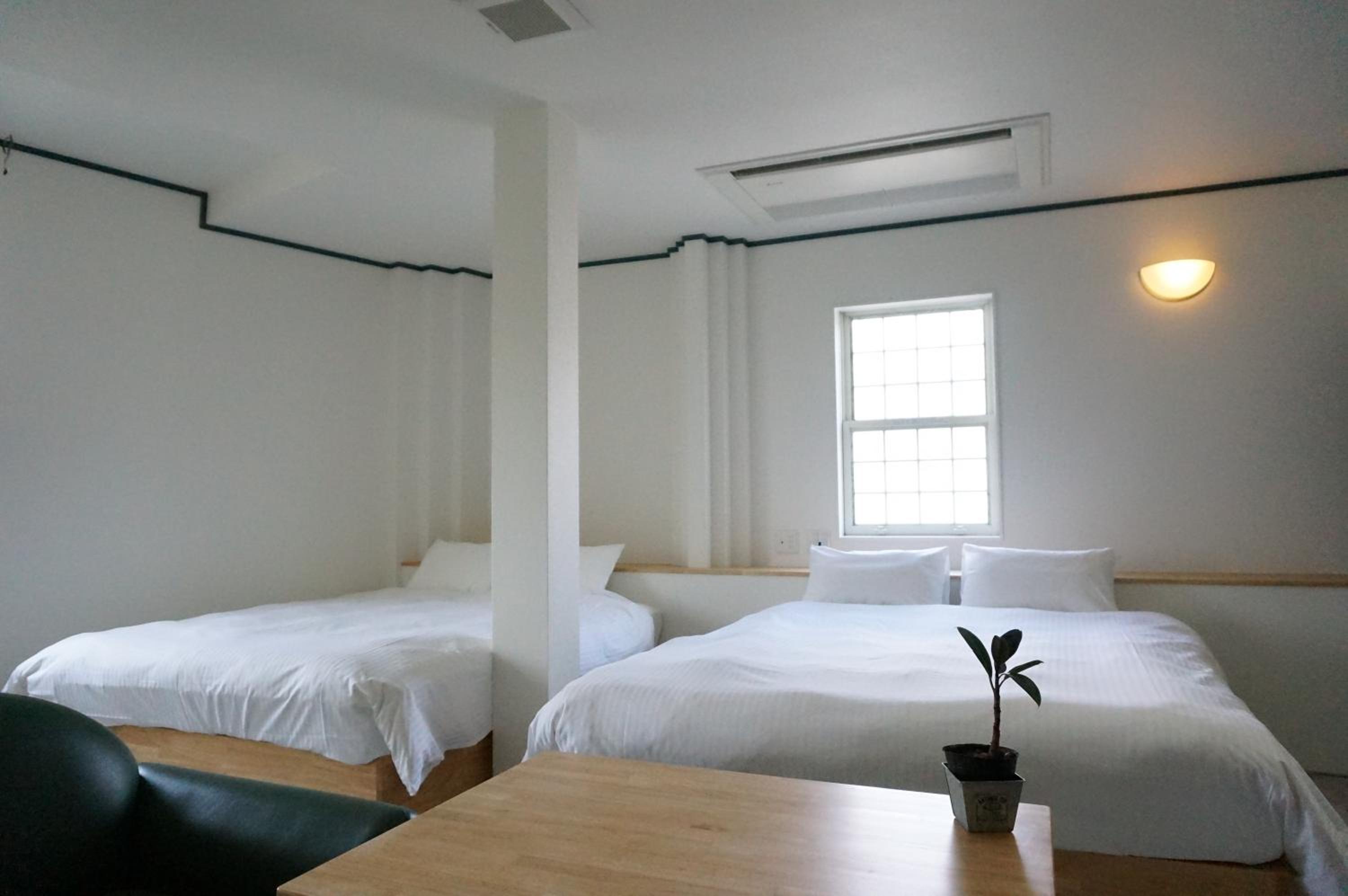 Twin Room with Two Queen Beds - Non-Smoking photo 3