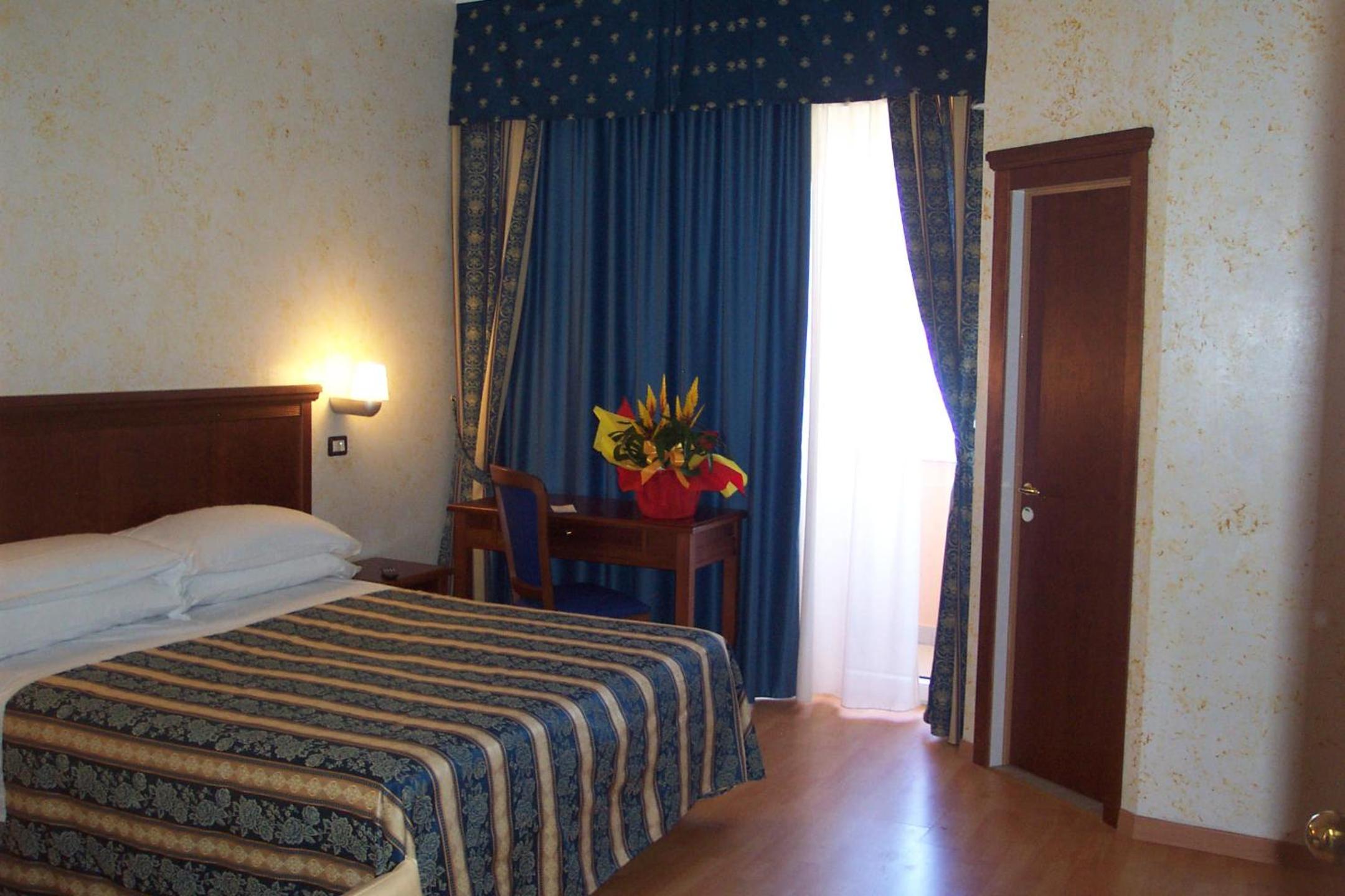Quadruple Room with Balcony