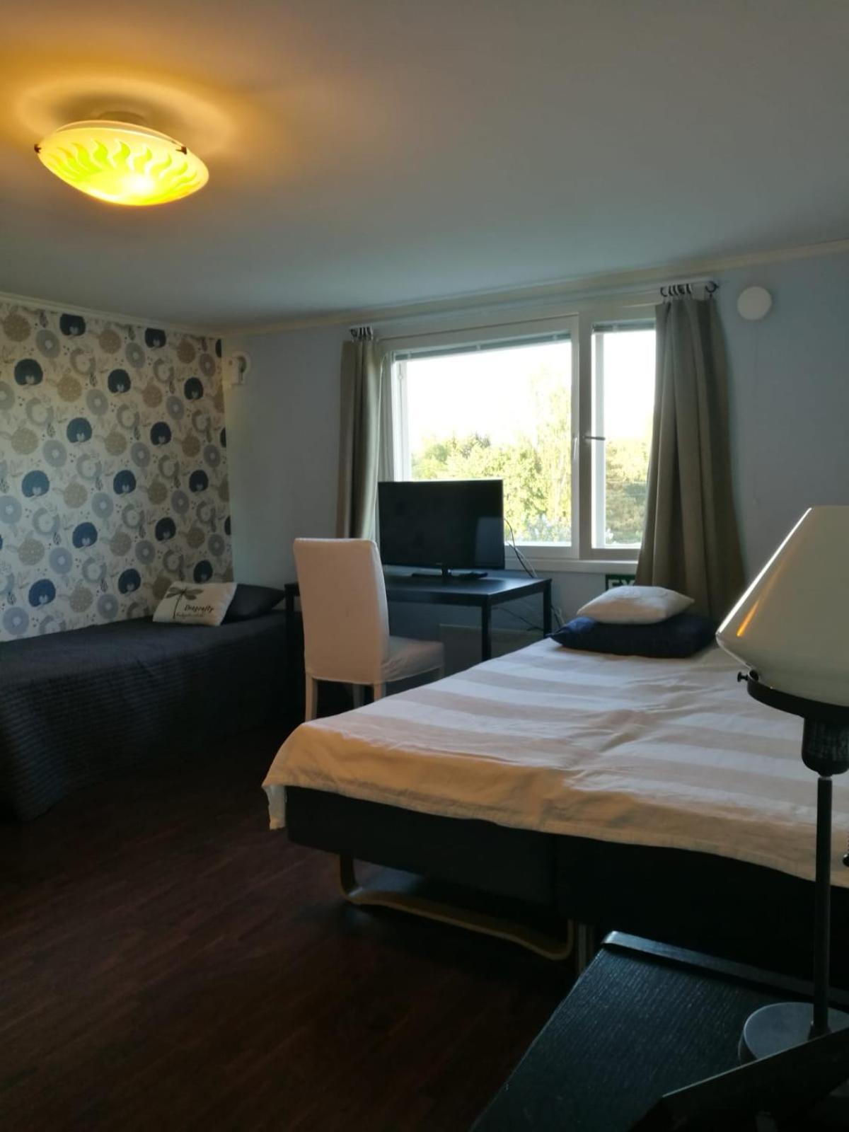 Basic Triple Room with Shared Bathroom photo 1