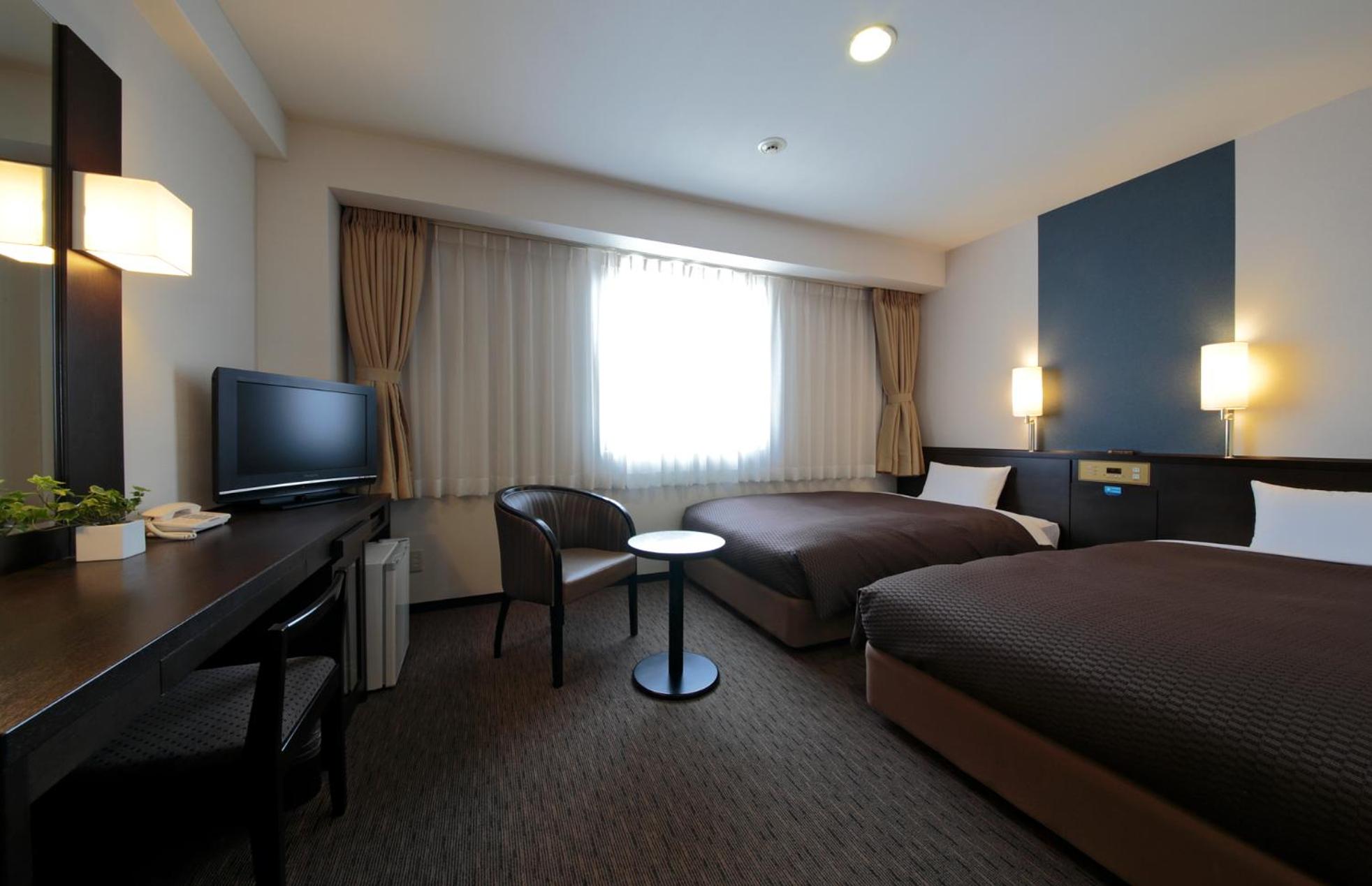 Twin Room - Non-Smoking - Photo 1