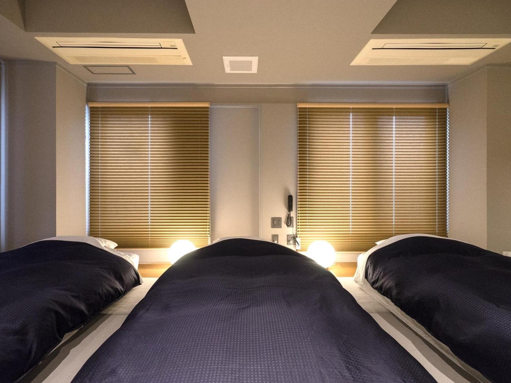 Japanese-Style Triple Room with Shower - Non-Smoking photo 1