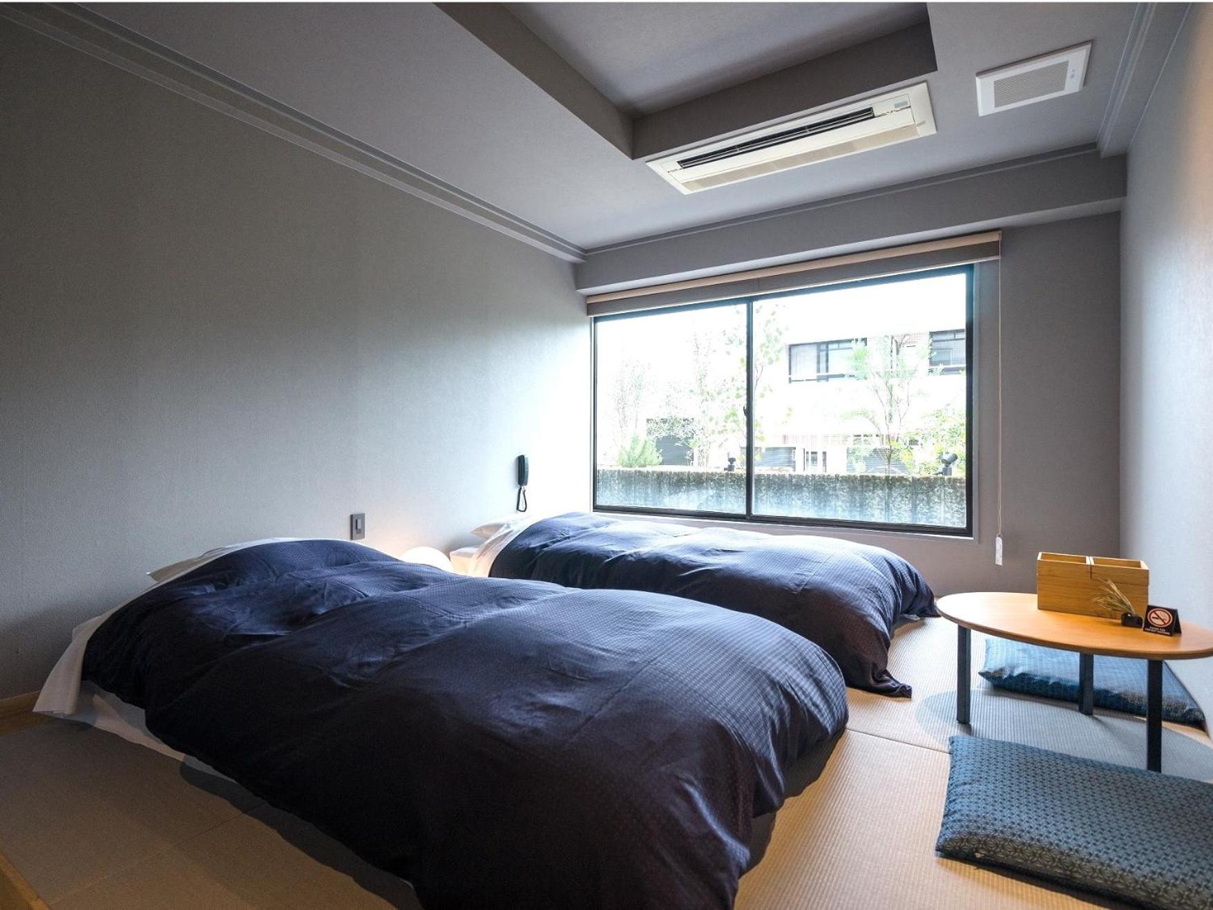 Japanese-Style Twin Room with Shower - Non-Smoking photo 1