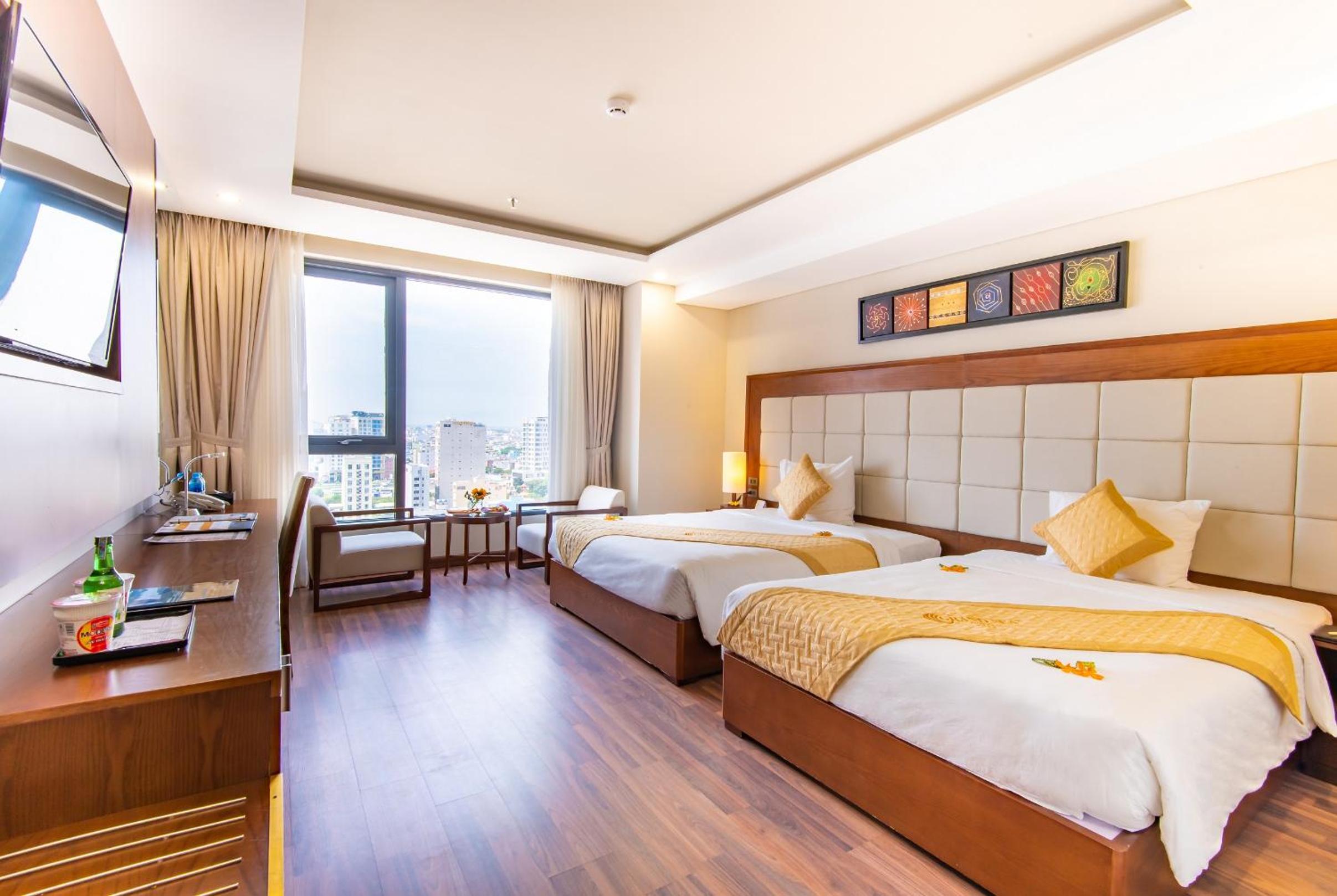 Family Deluxe Room with One Queen & One Double Bed and City View
