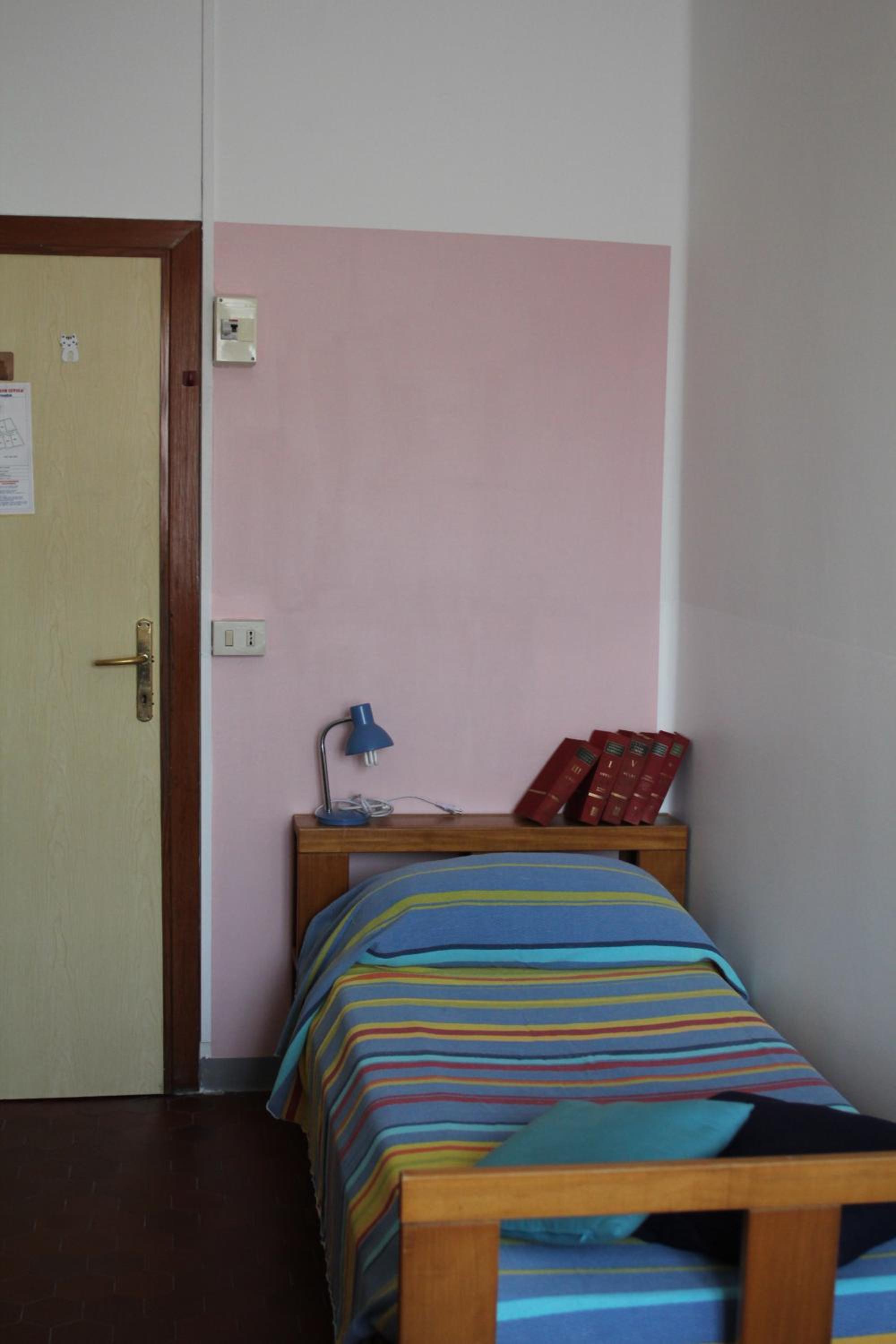 Camera Singola con bagno condiviso