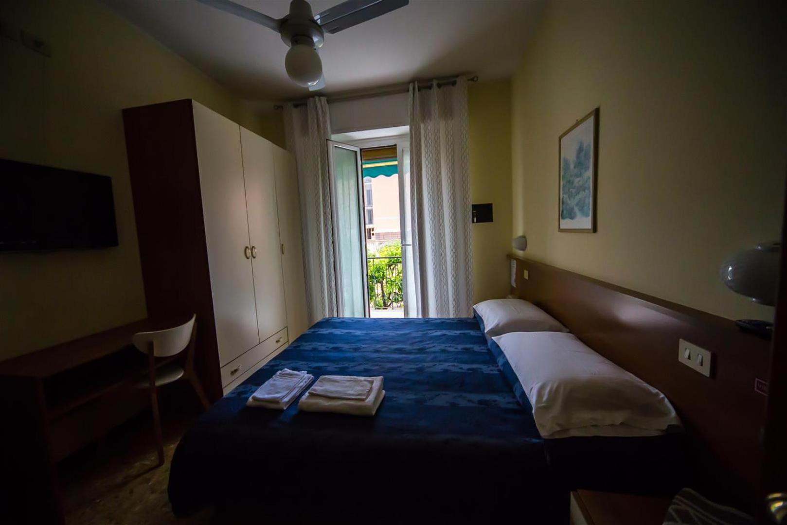 Quadruple Room with Balcony - Photo 1