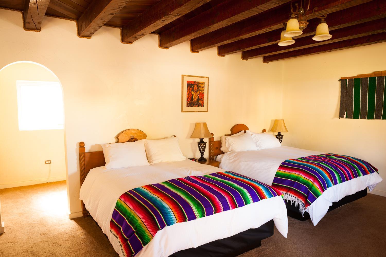 Queen Room with Two Queen Beds - Photo 2