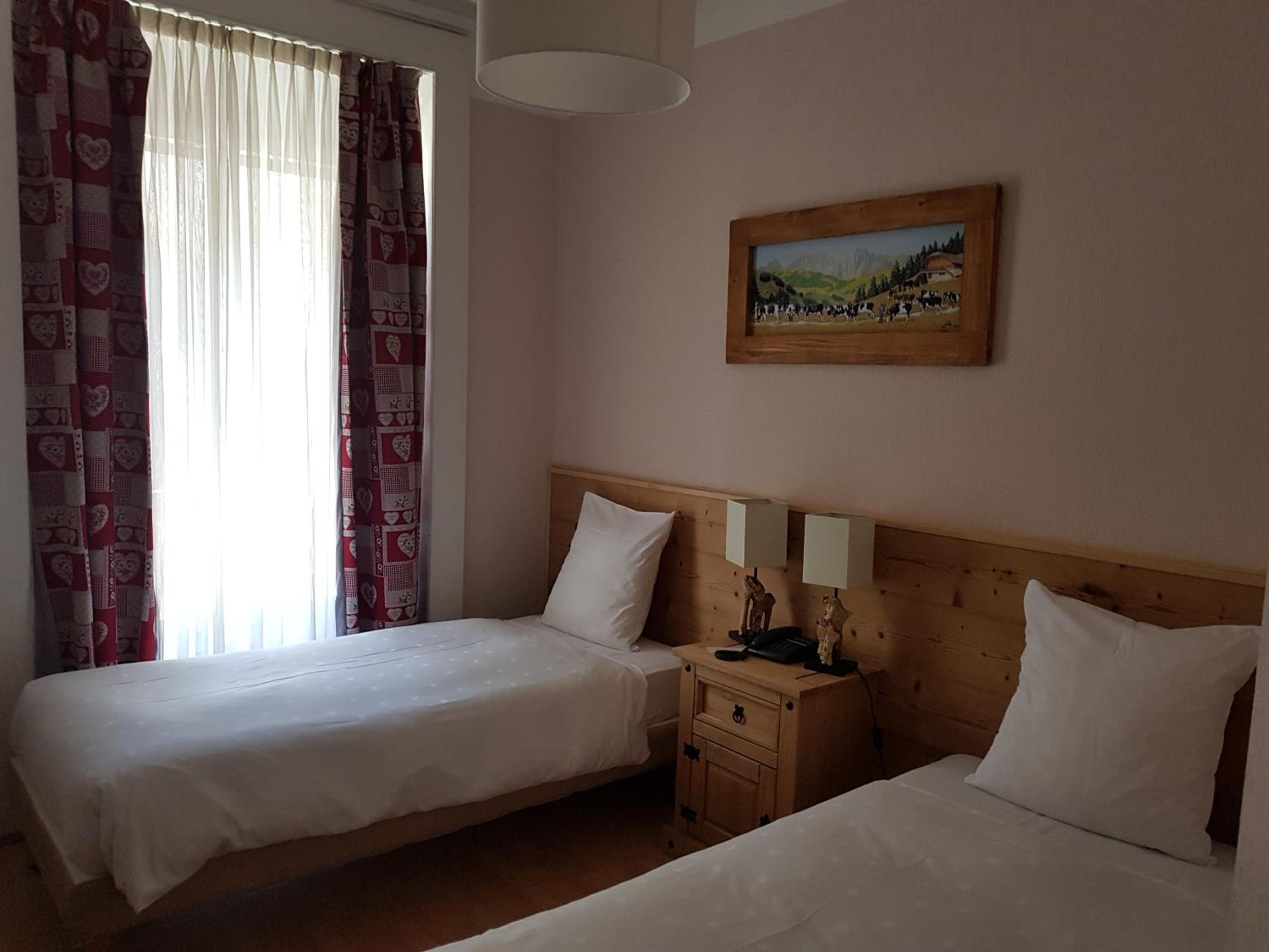 Twin Room - Photo 16