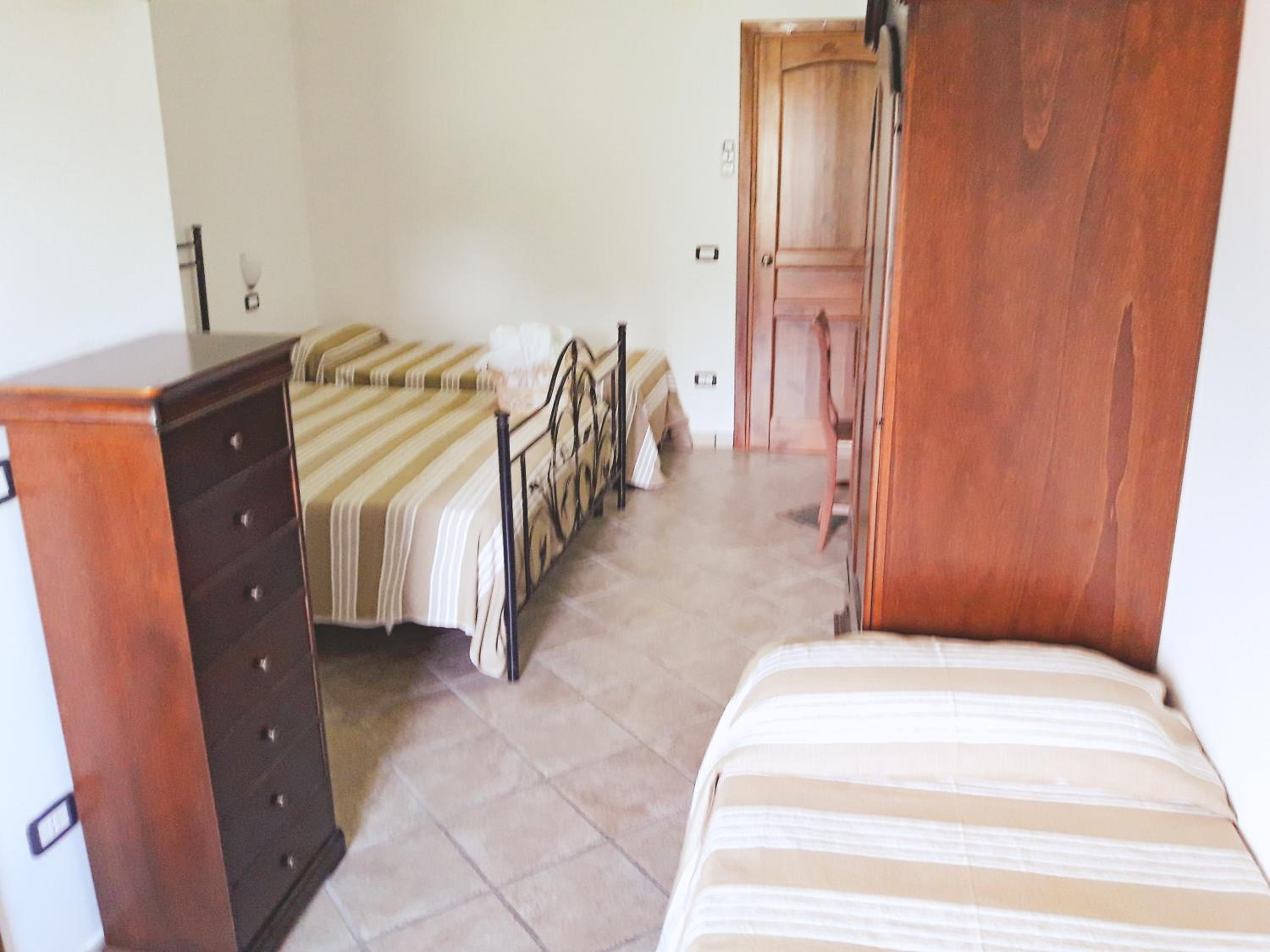 Quadruple Room with Private Bathroom photo 1