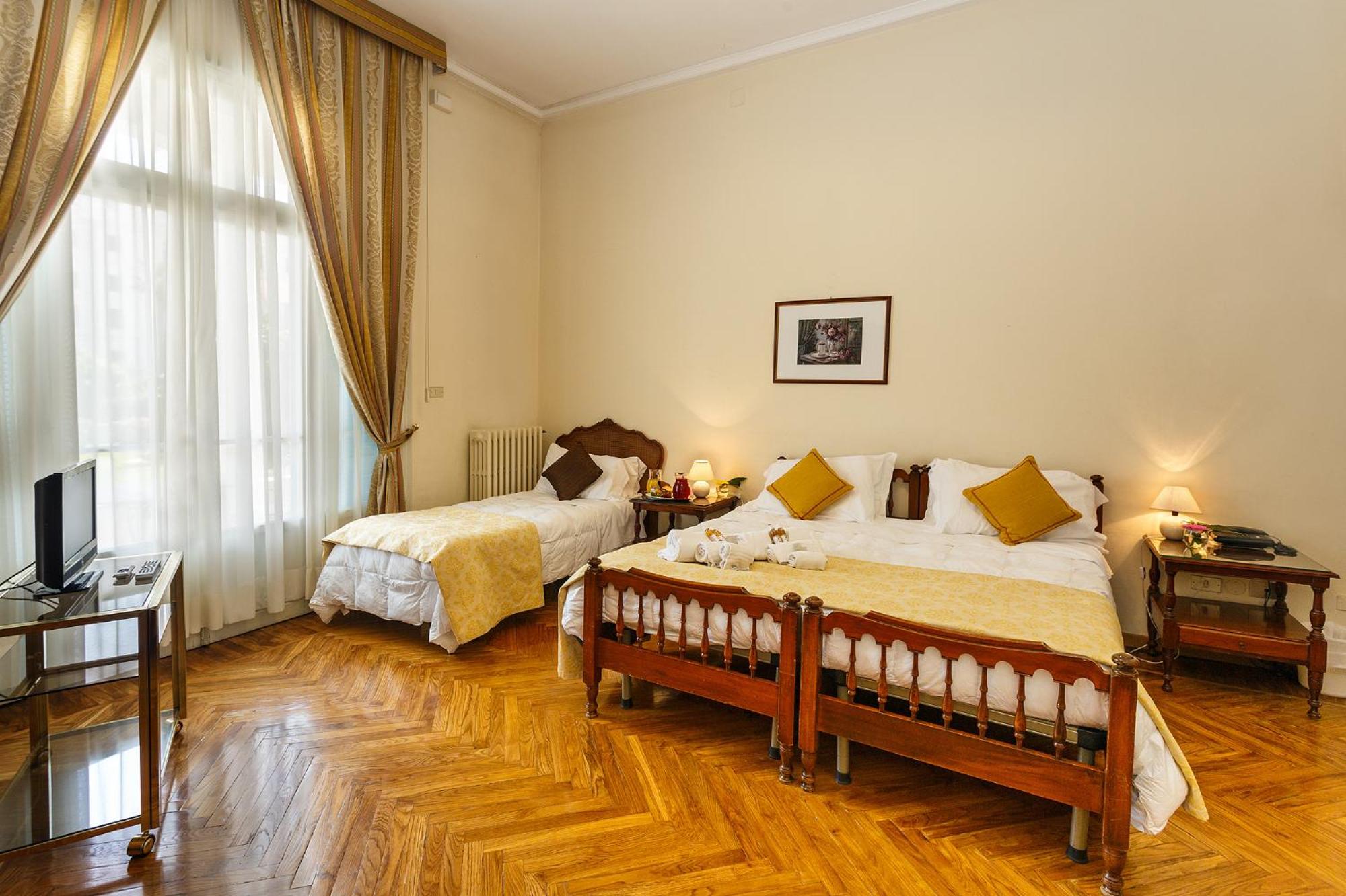 Family Quadruple Room - Photo 1