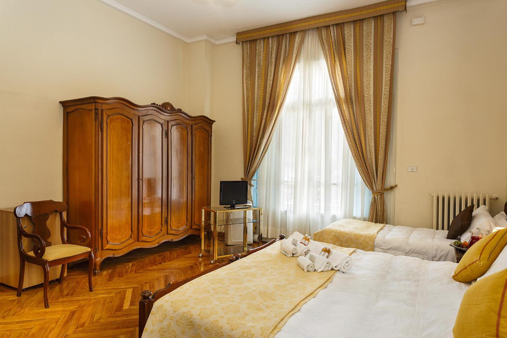 Family Quadruple Room - Photo 3