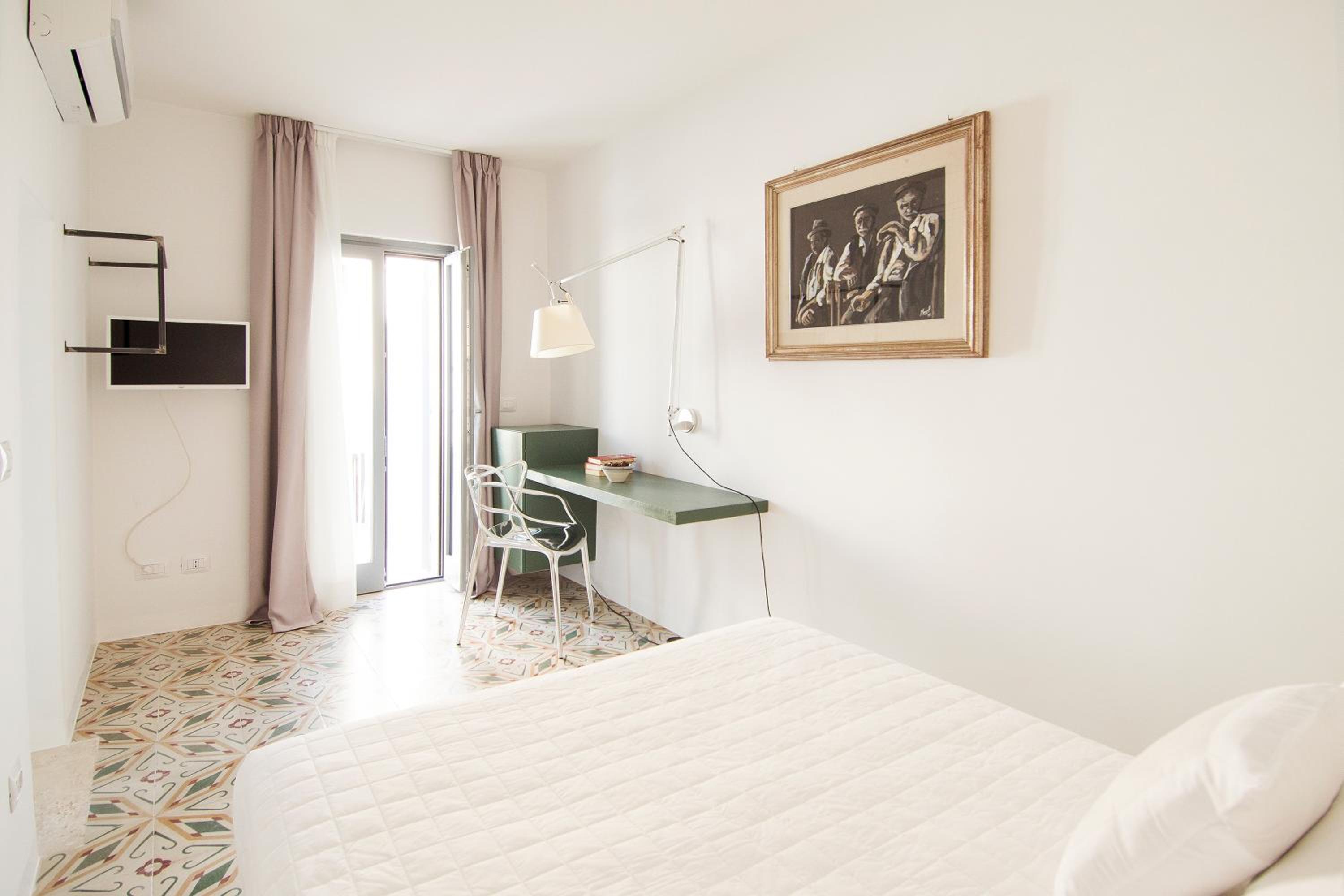 Chambre Double Deluxe - Vue Latérale sur Mer