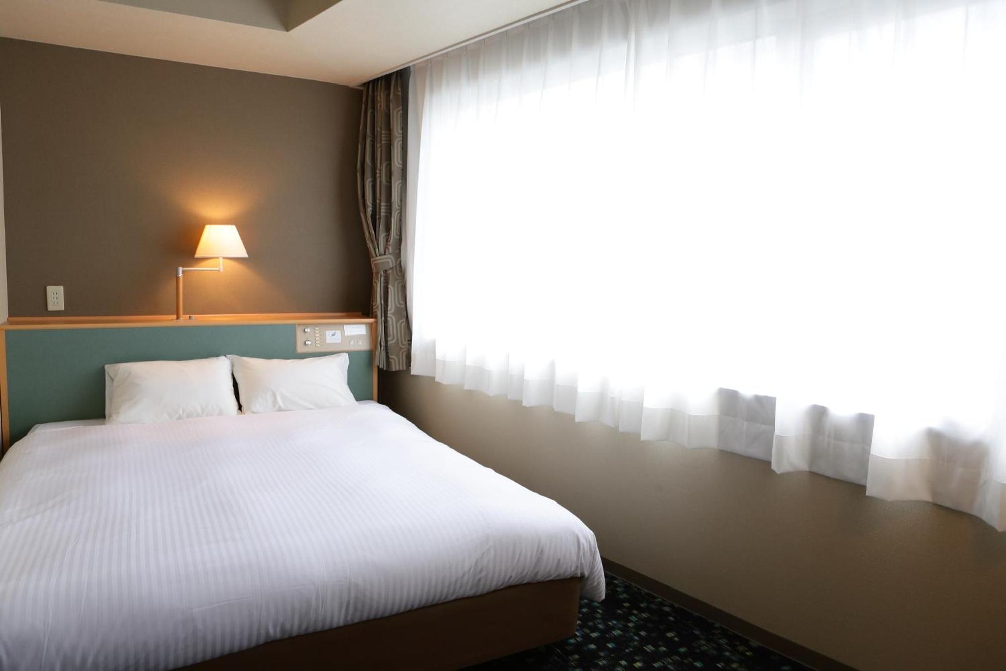 Wide Double Room - Smoking - Photo 1