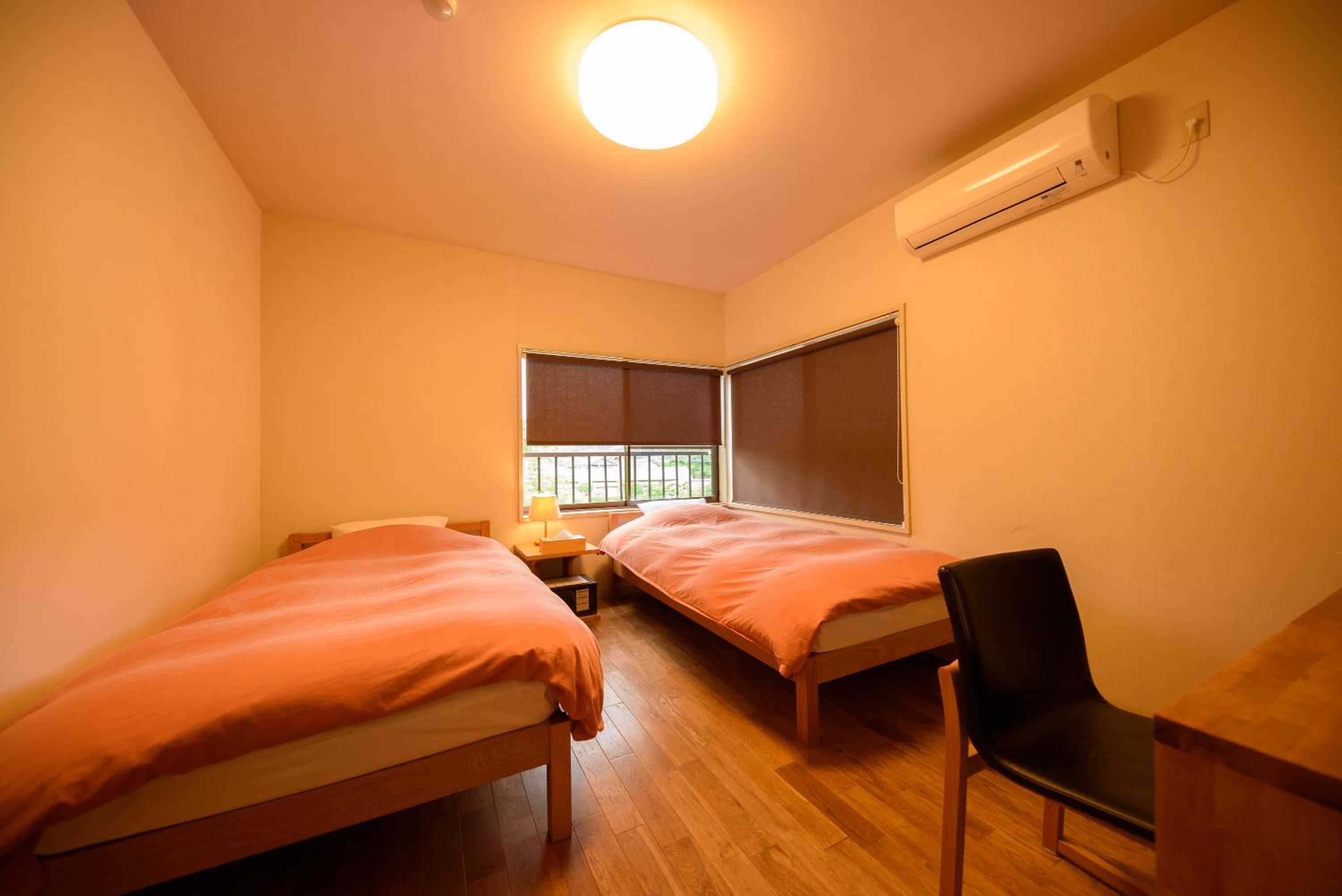 Twin Room with Shared Bathroom (Adult Only) photo 1