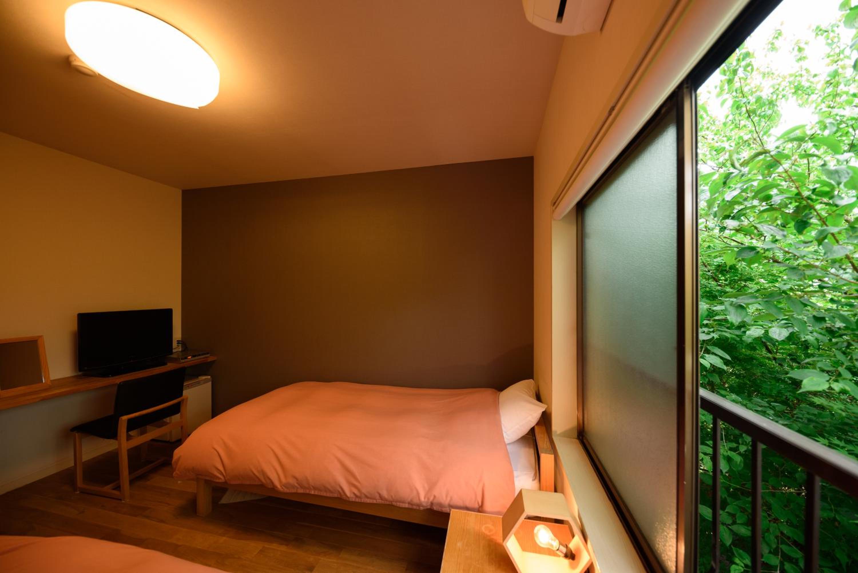 Twin Room with Shared Bathroom (Adult Only) photo 3