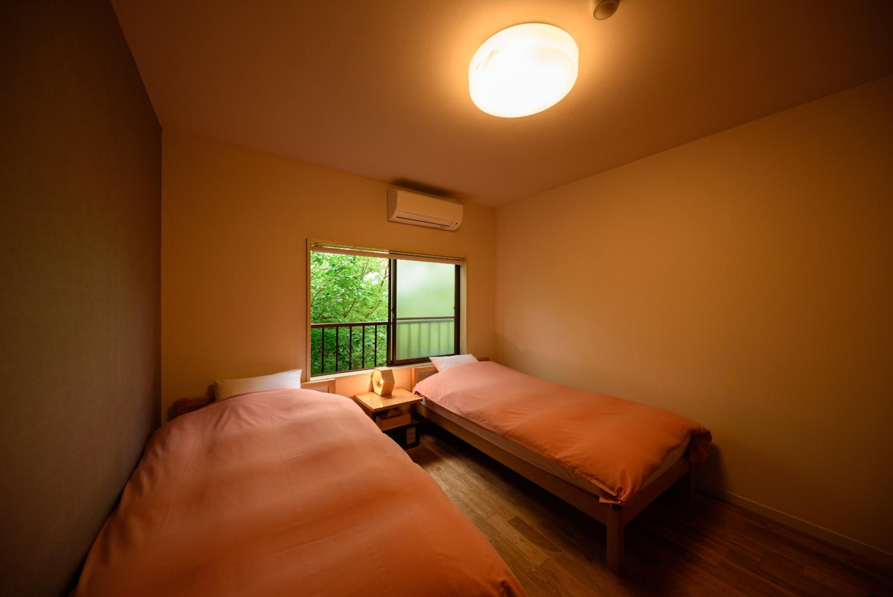 Twin Room with Shared Bathroom (Adult Only) photo 2