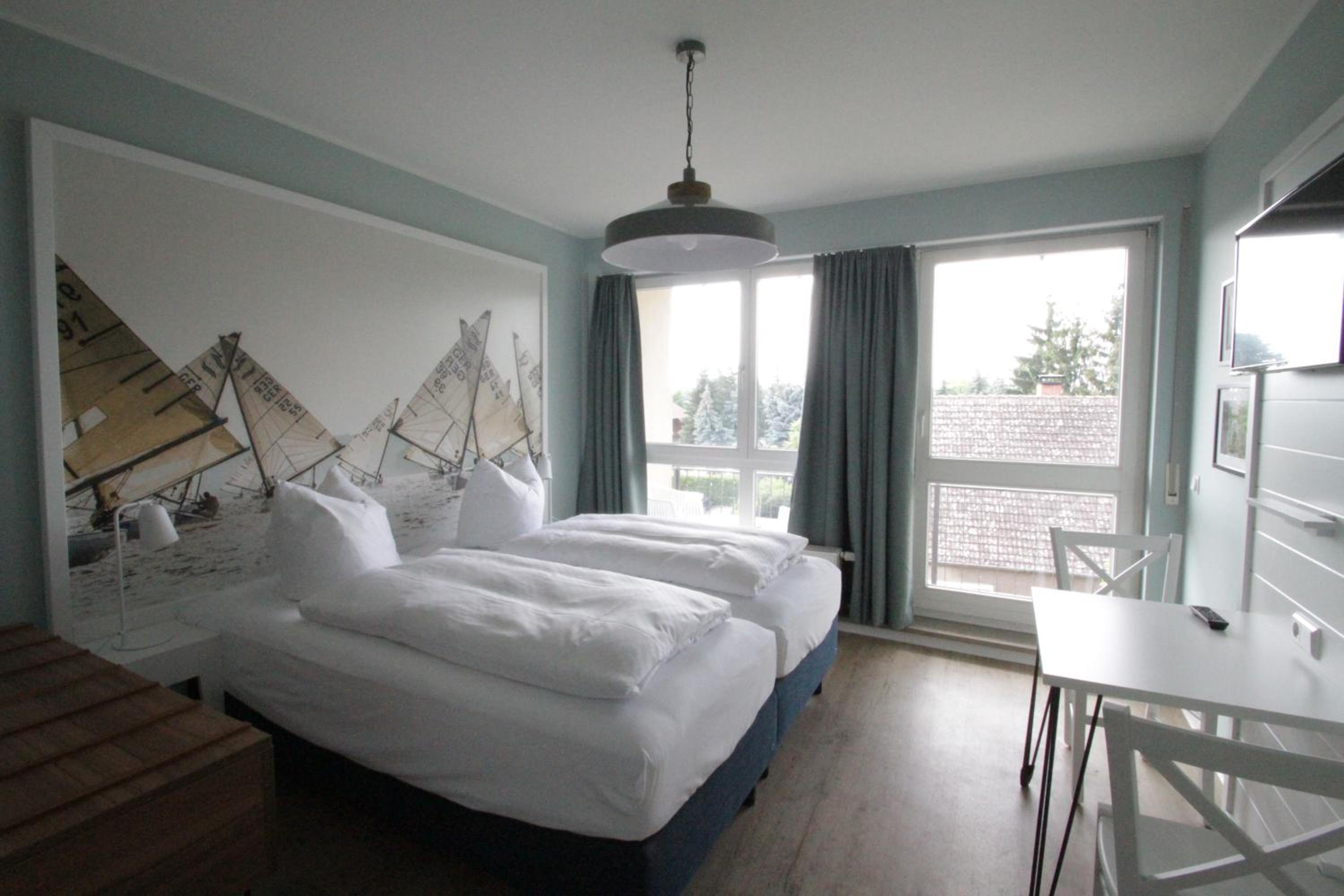 Family Room with Balcony - Photo 1