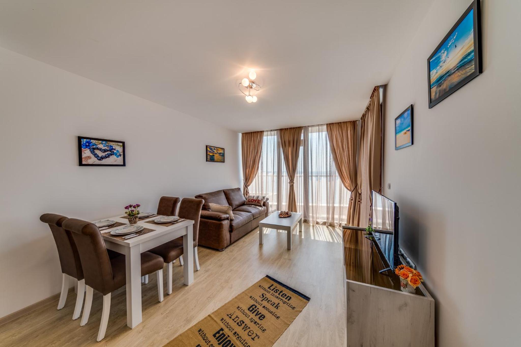 One-Bedroom Apartment with Balcony and Sea View