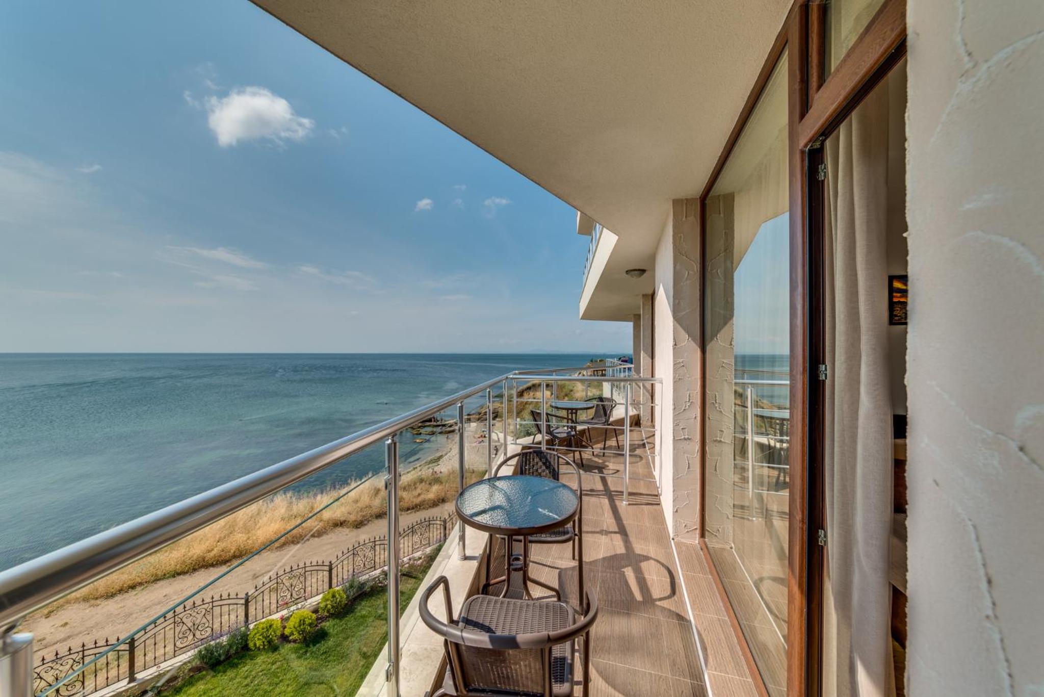 One-Bedroom Apartment with Balcony and Sea View