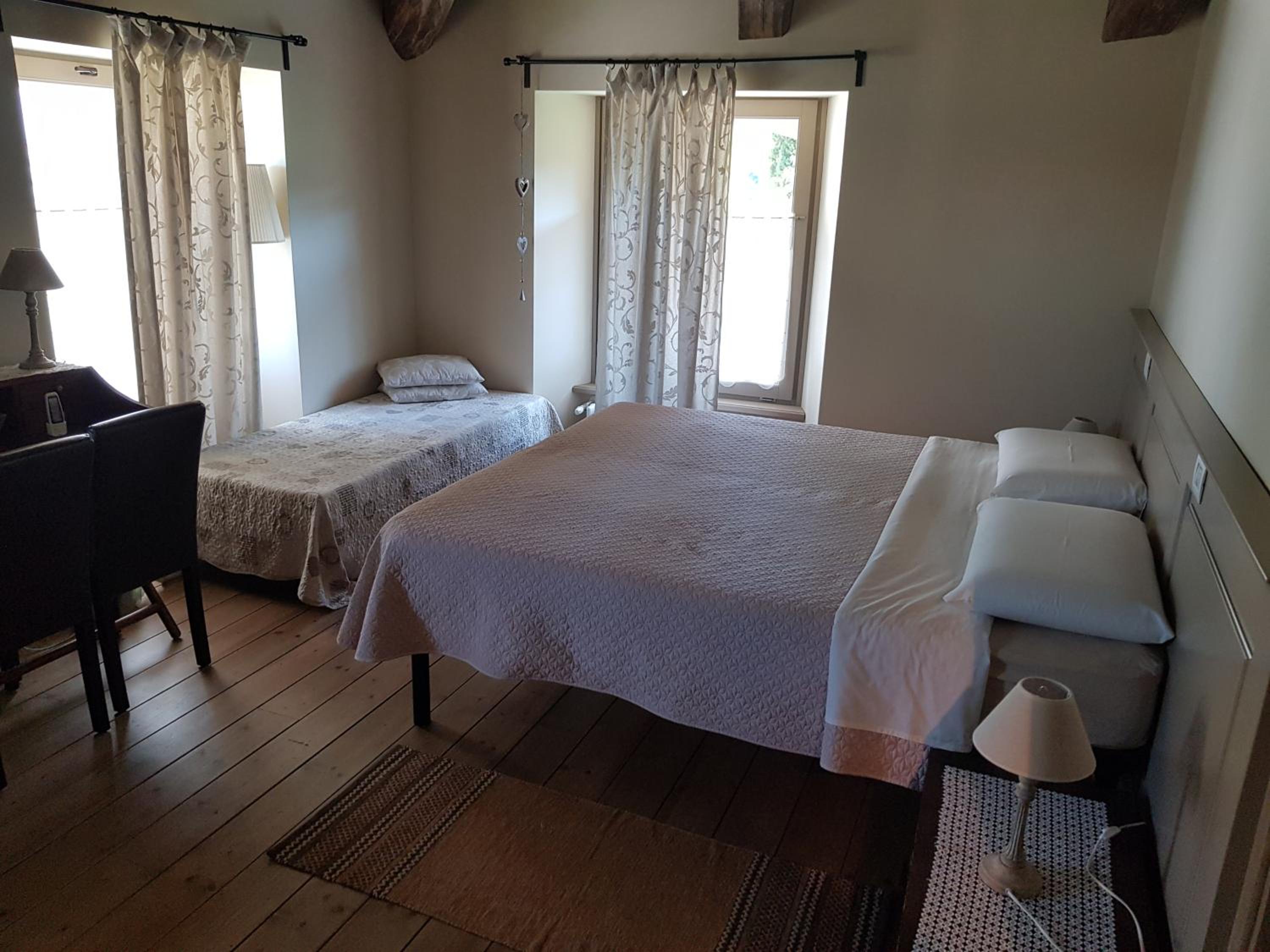 Deluxe Quadruple Room - Photo 4