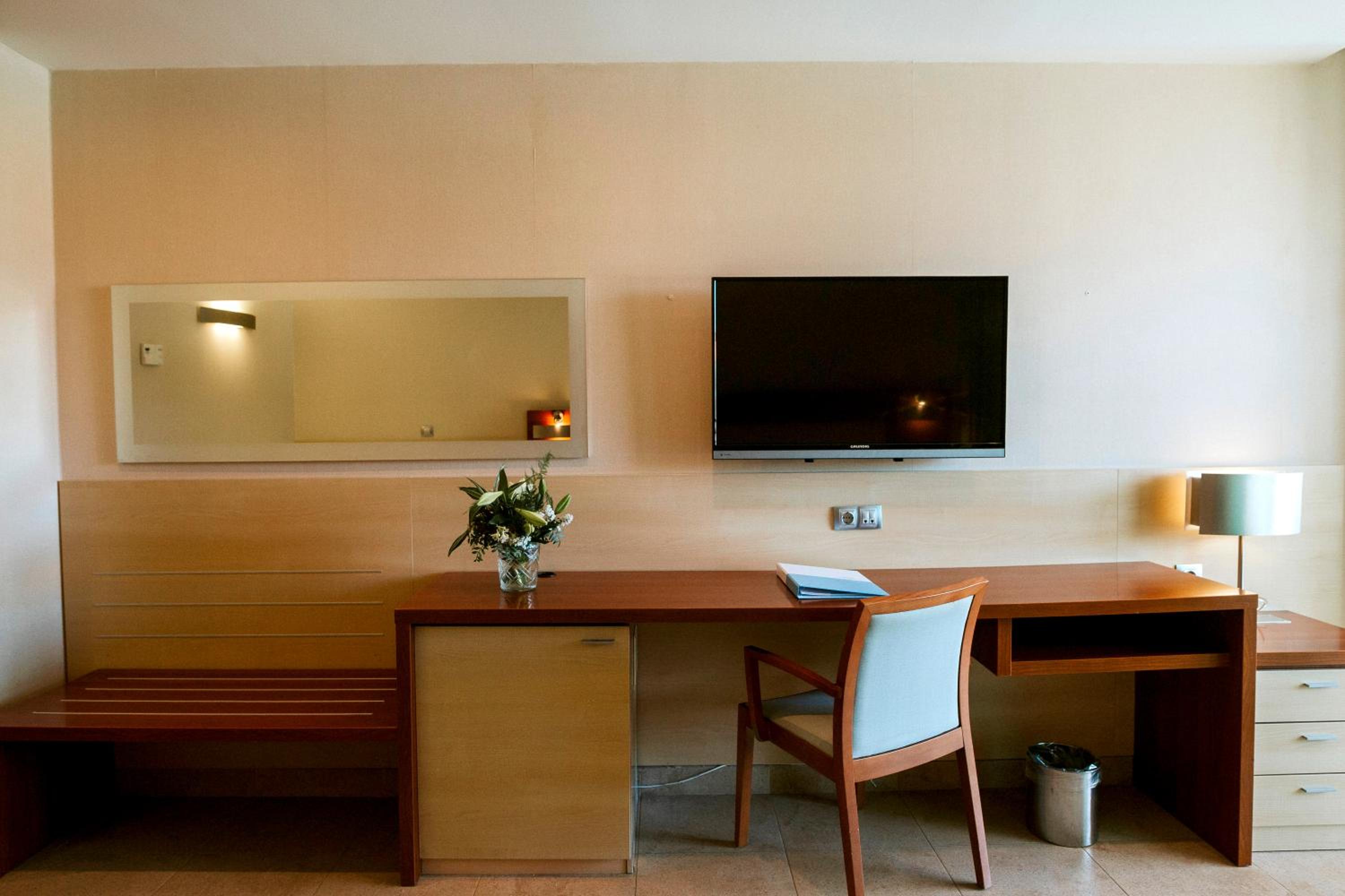 Habitación Cuádruple (3 Adultos + 1 Niño)