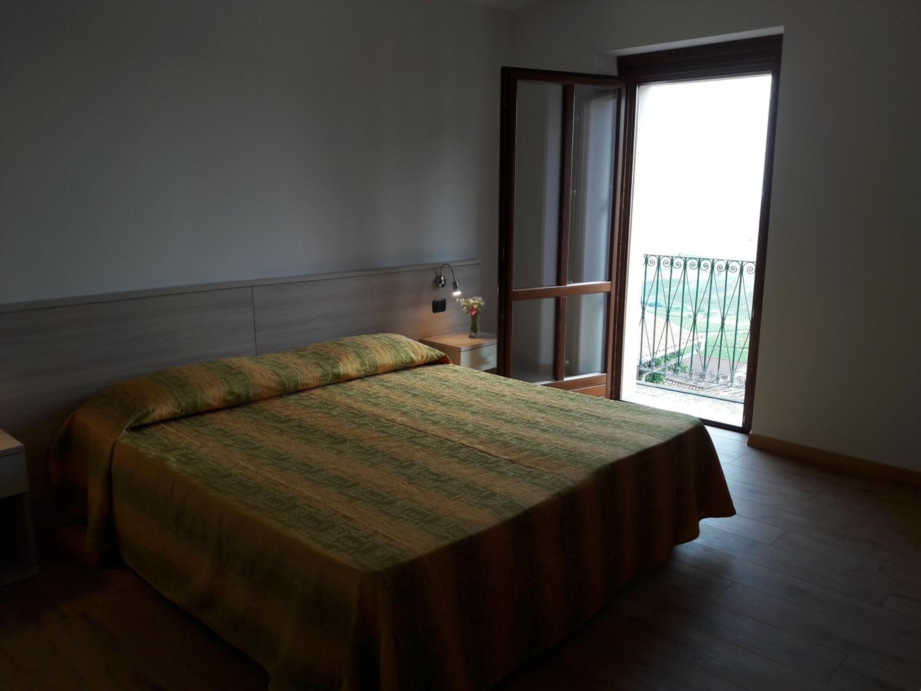Deluxe Double Room with Balcony - Photo 1