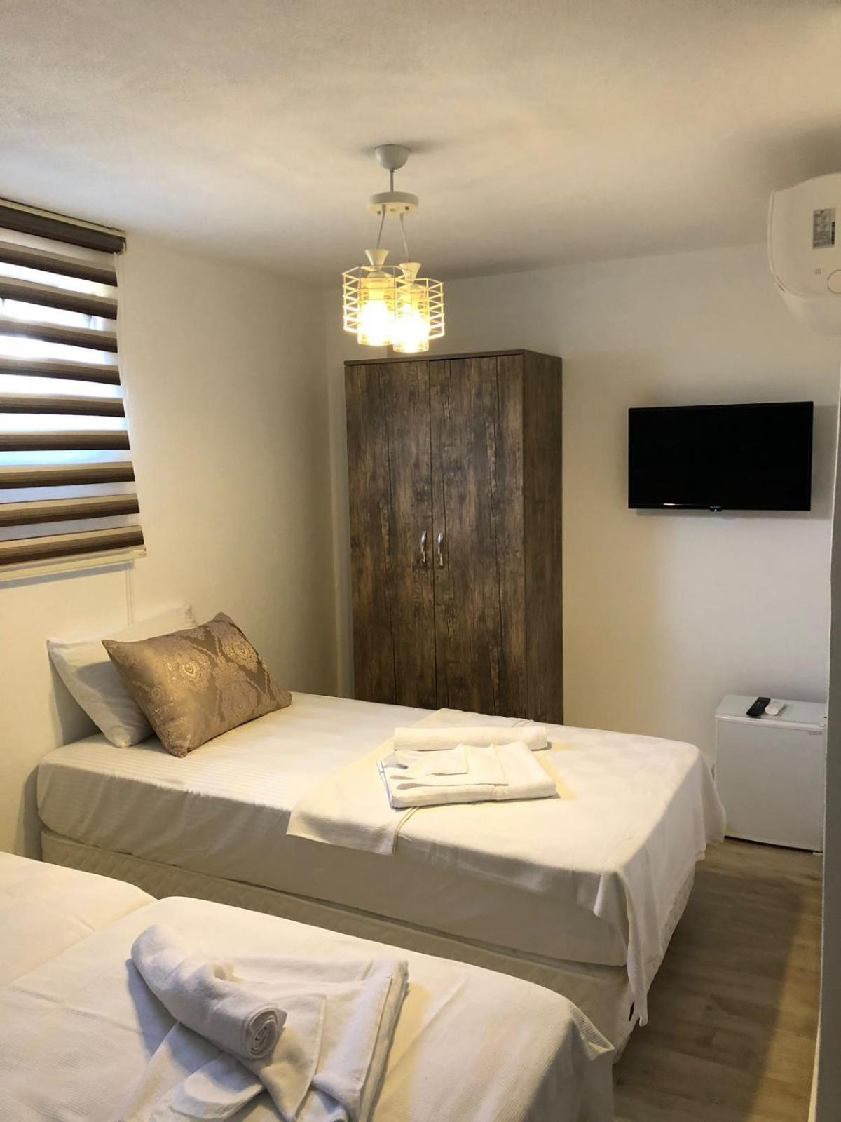 Economy Triple Room photo 1