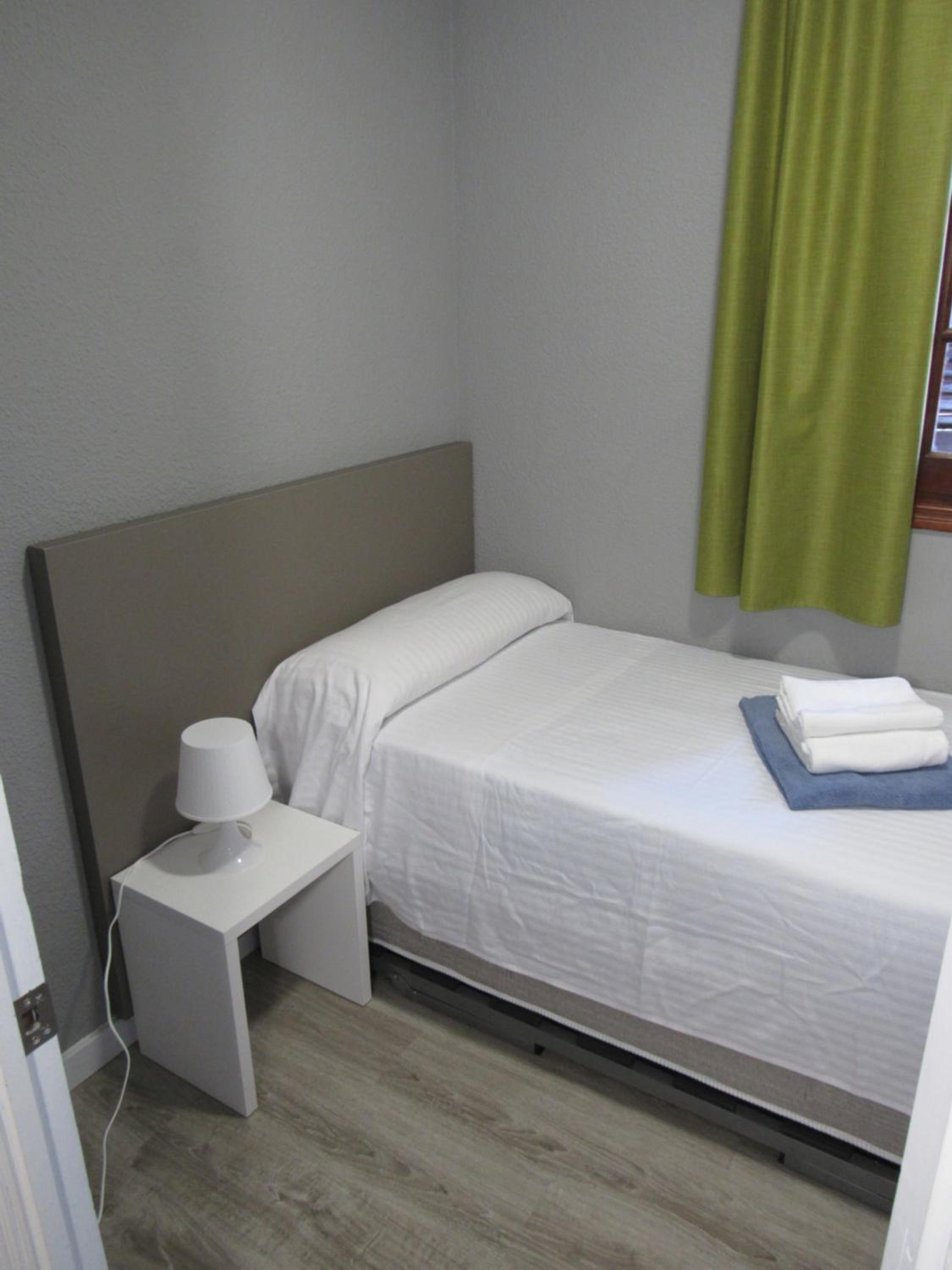 Apartamento de tres habitaciones con literas