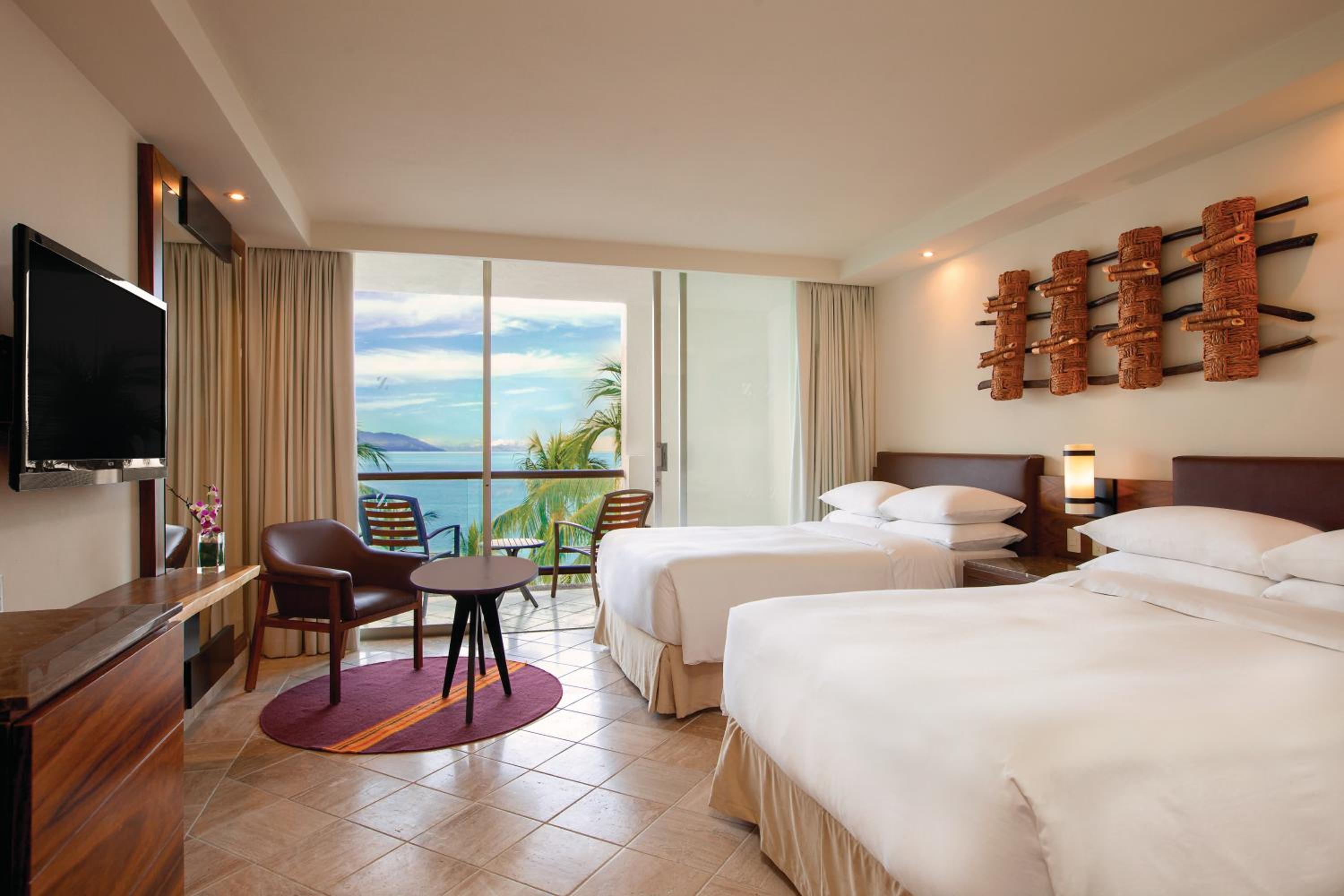 Double Room with Two Double Beds, Oceanfront View and Balcony