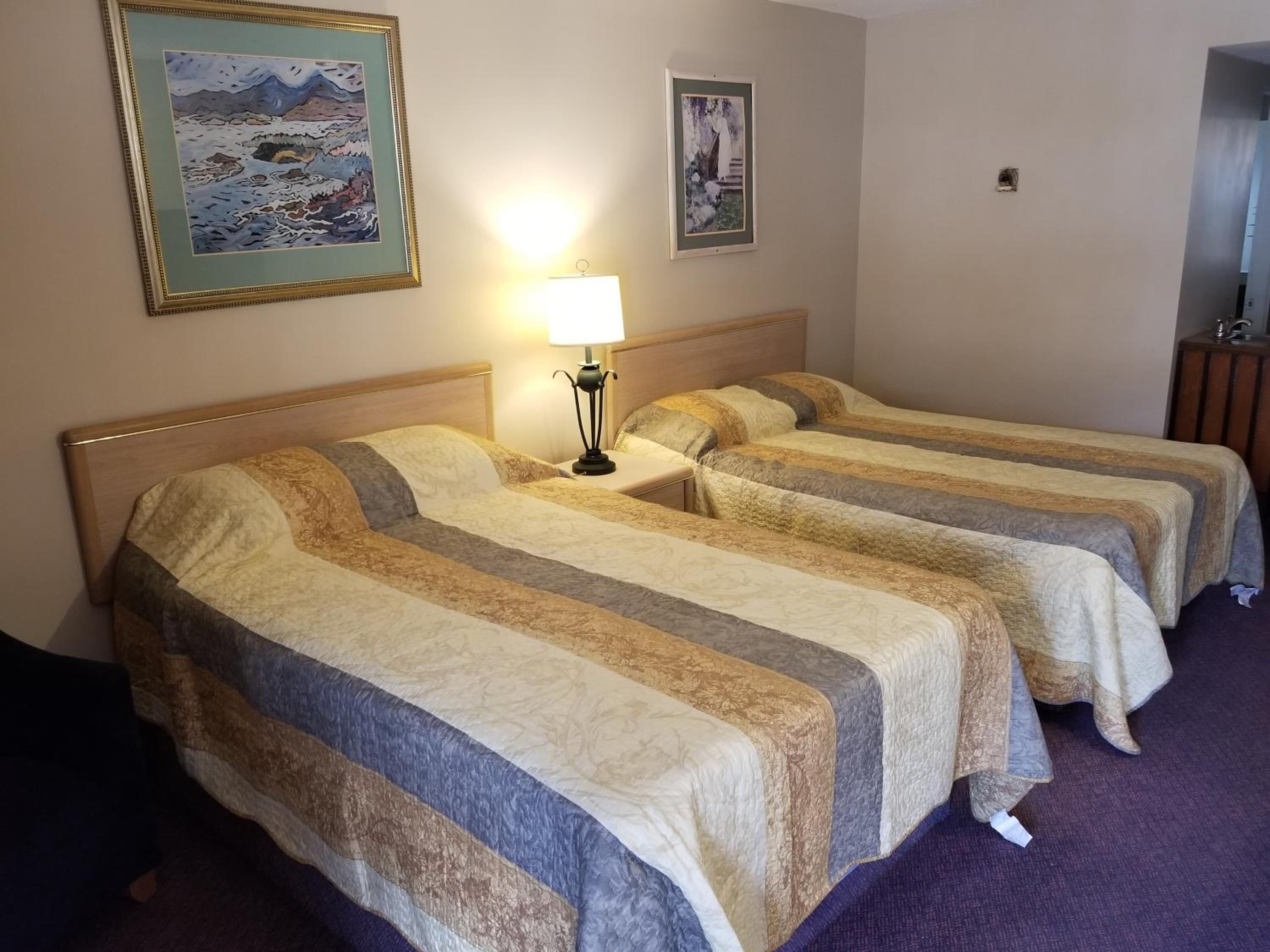Deluxe Double Room (2 Adults + 1 Child) photo 2