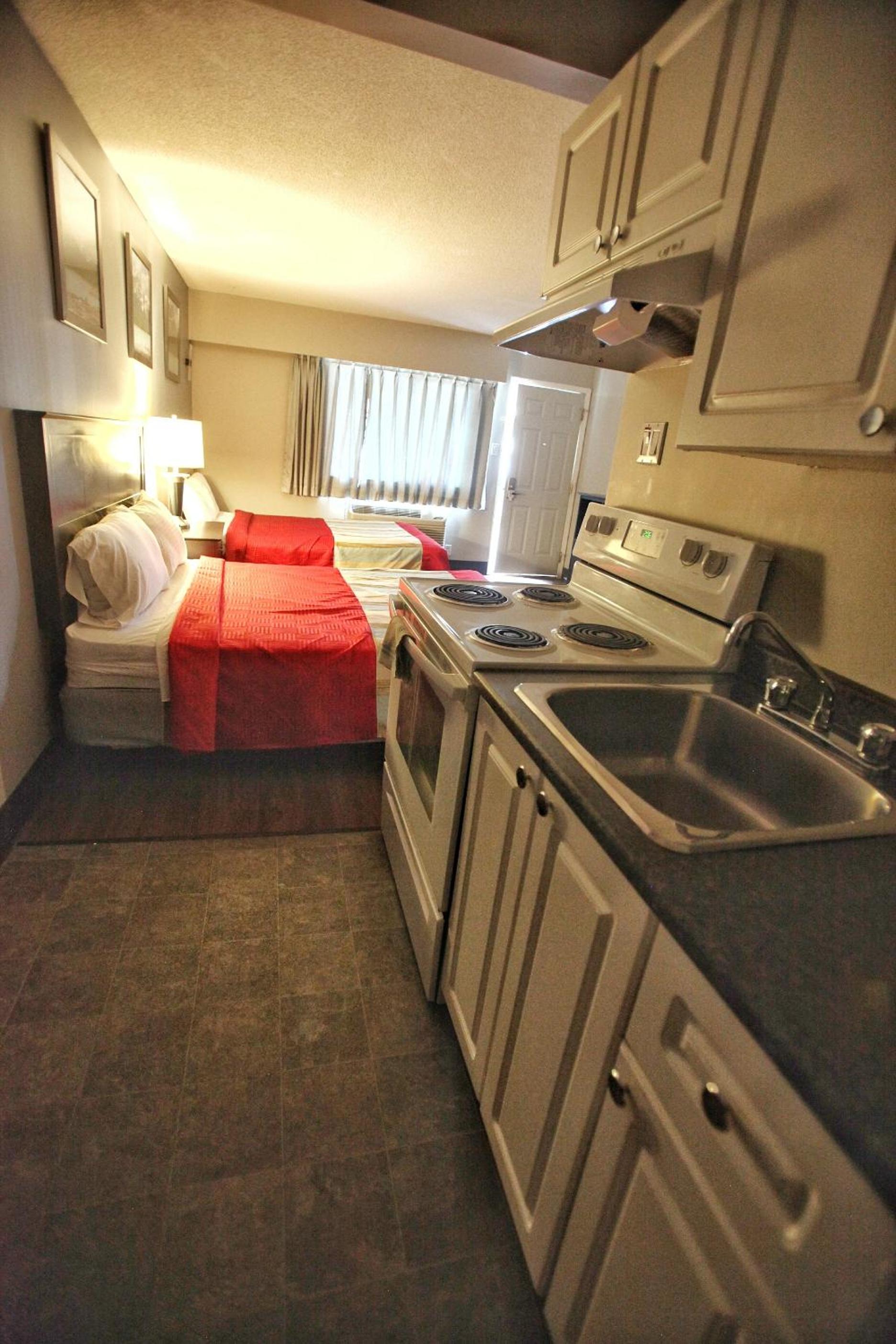 Queen Room with Two Queen Beds and Kitchen - Non-Smoking photo 3