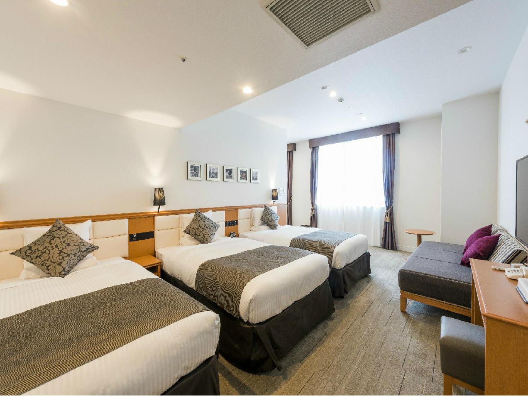 Deluxe Triple Room - Non-Smoking - Photo 1
