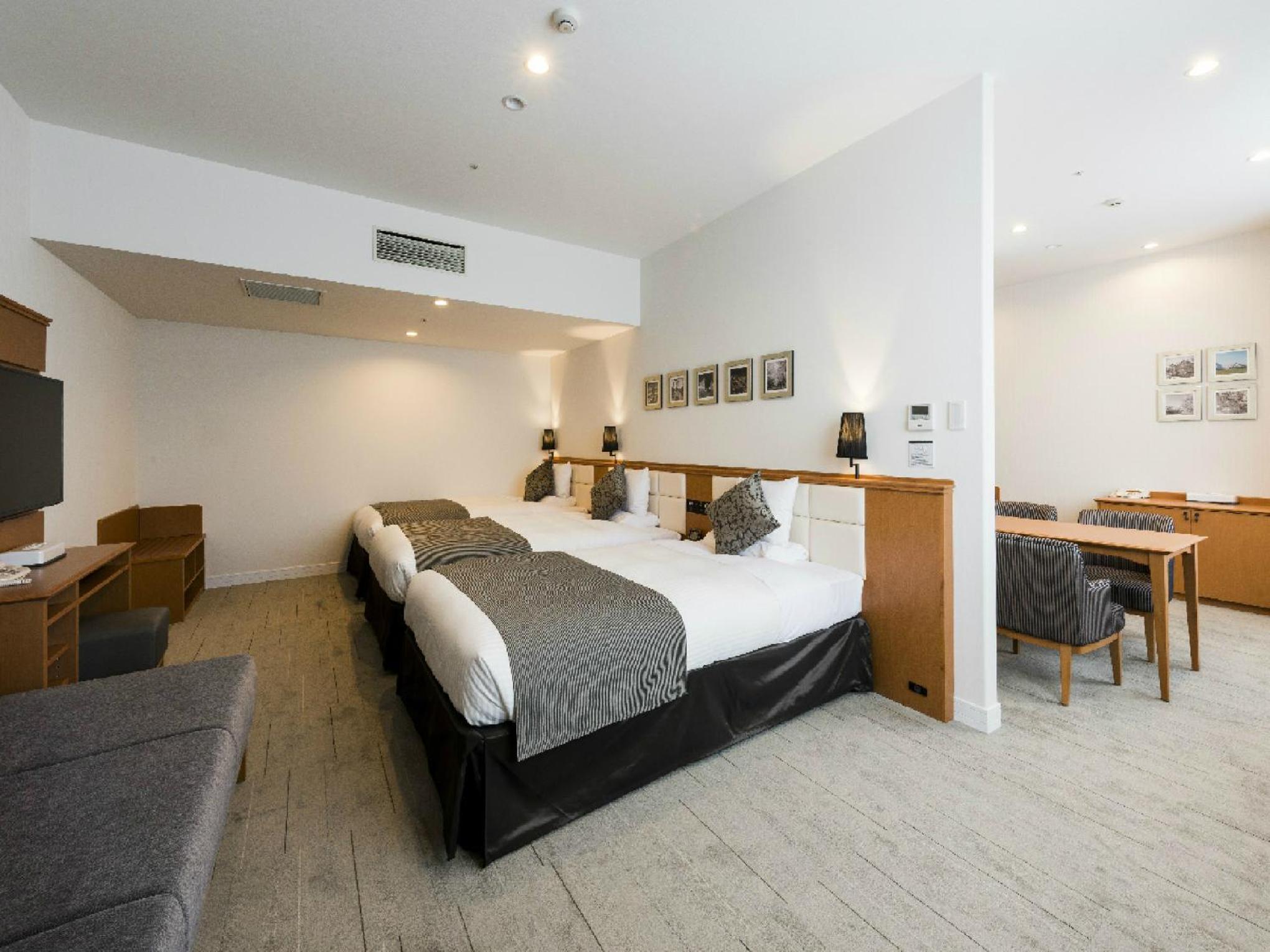 Deluxe Triple Room - Non-Smoking - Photo 7