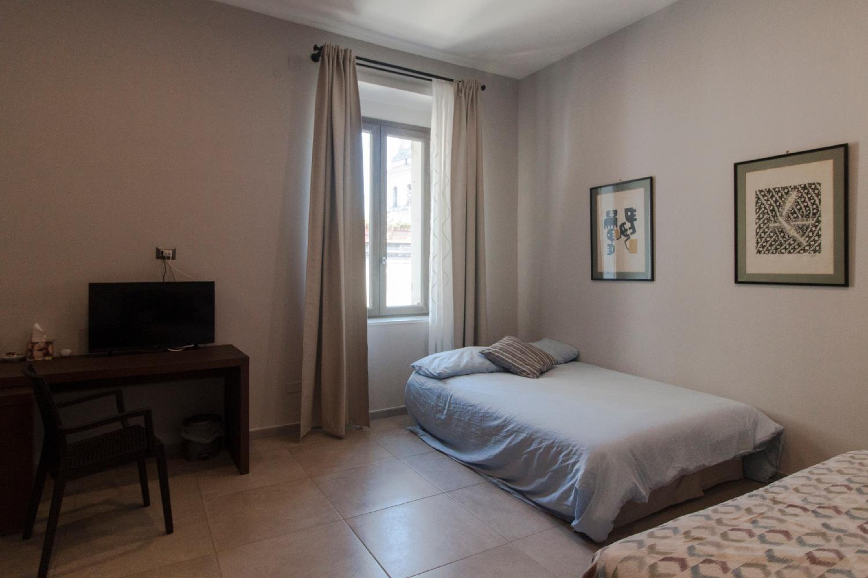 Quadruple Room with Private Bathroom