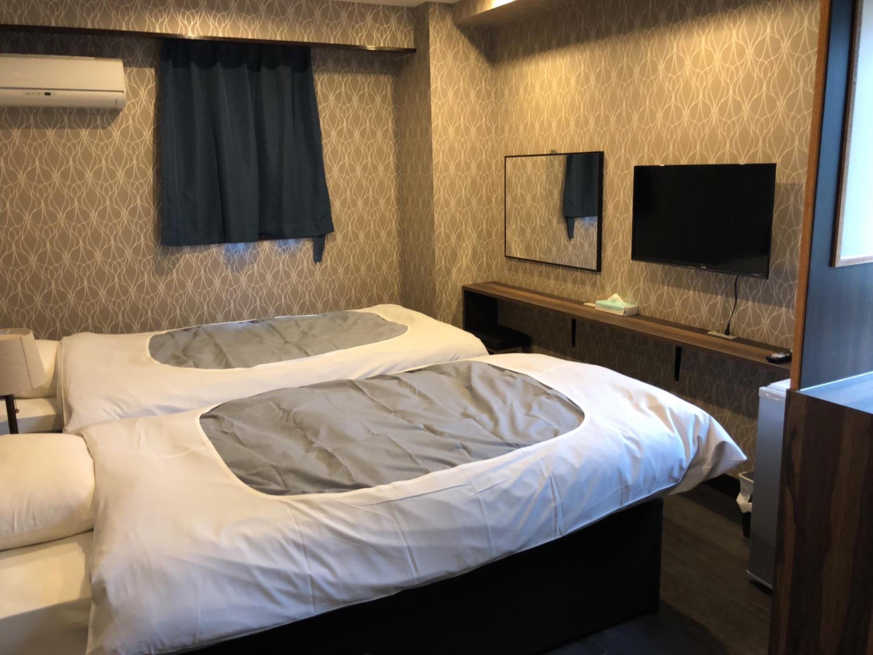 Twin Room - Photo 1