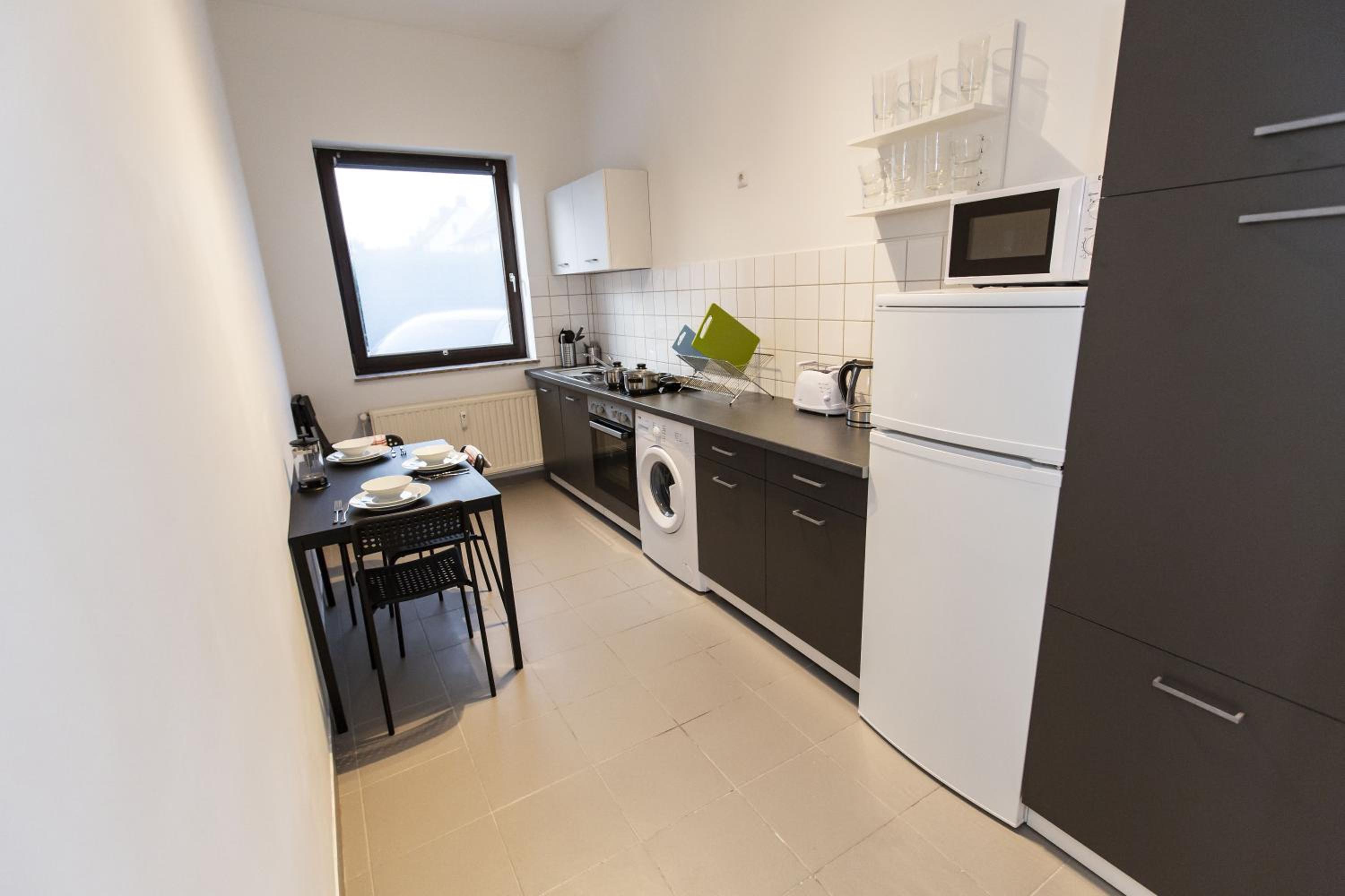 Three-Bedroom Apartment - Photo 7