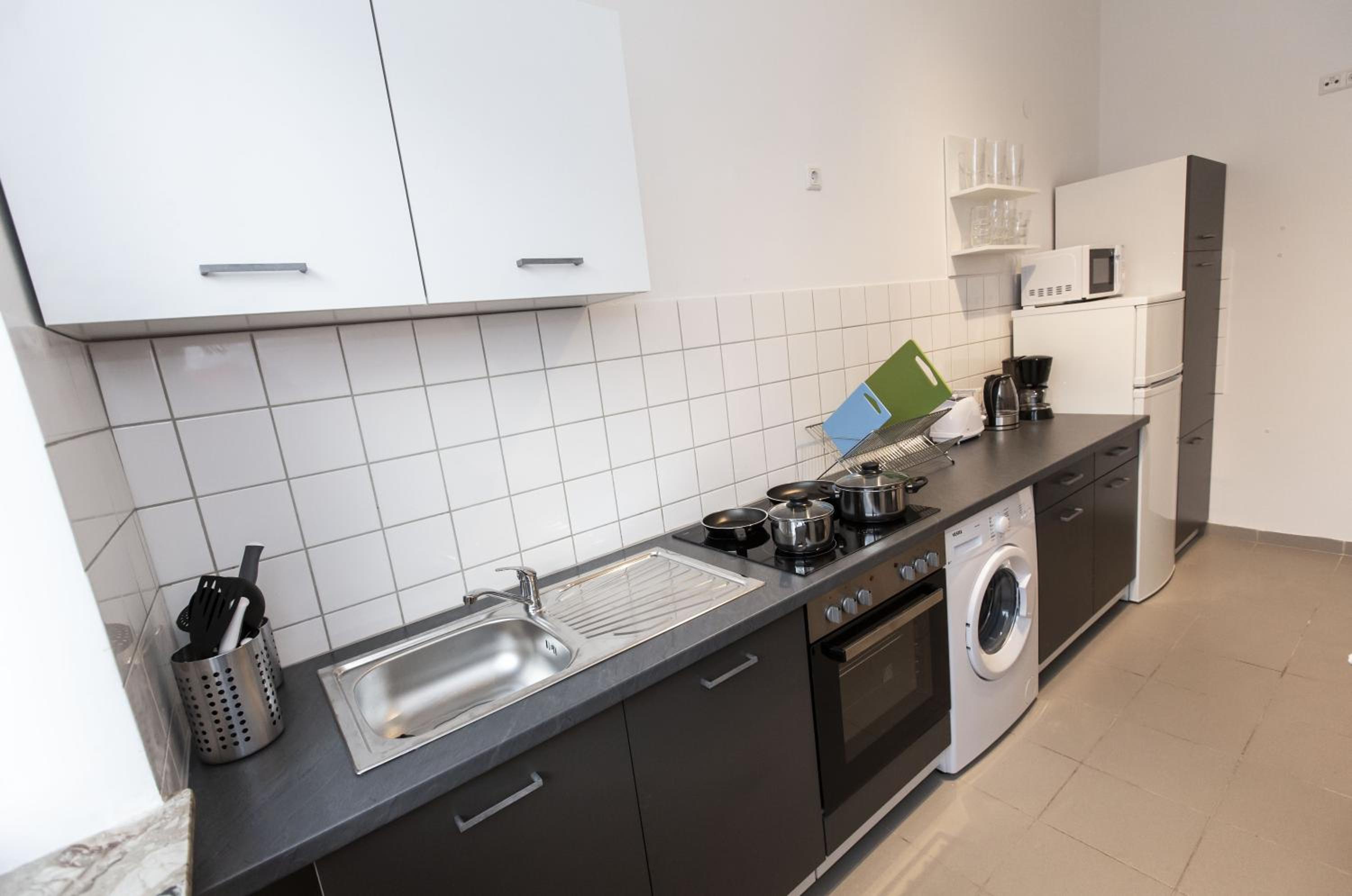 Three-Bedroom Apartment - Photo 6