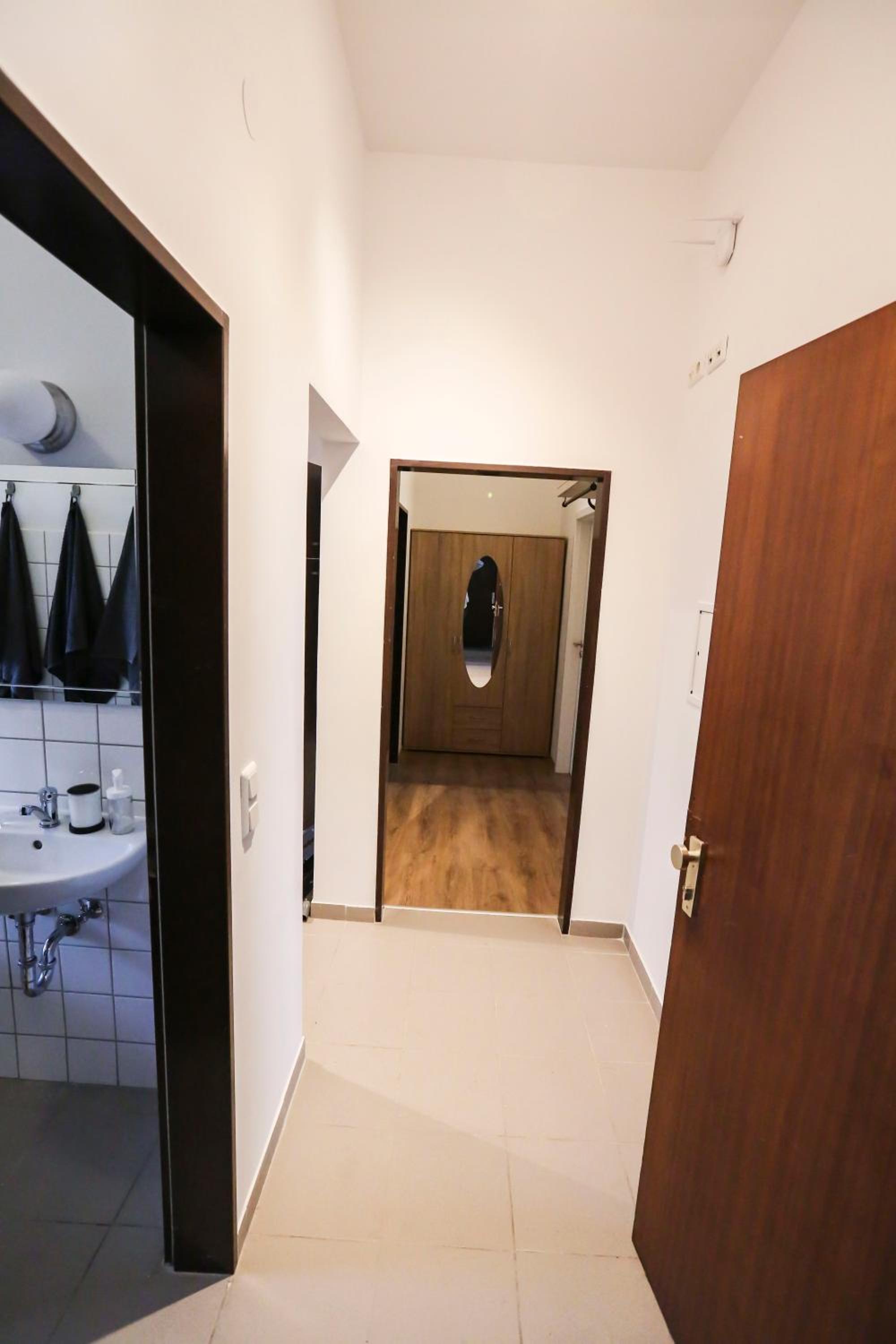 Three-Bedroom Apartment - Photo 12