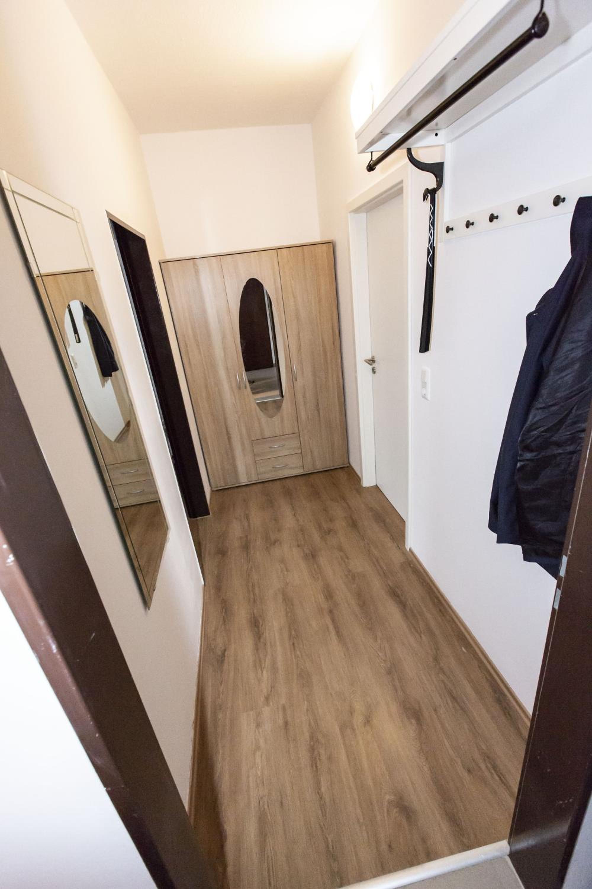 Three-Bedroom Apartment - Photo 13