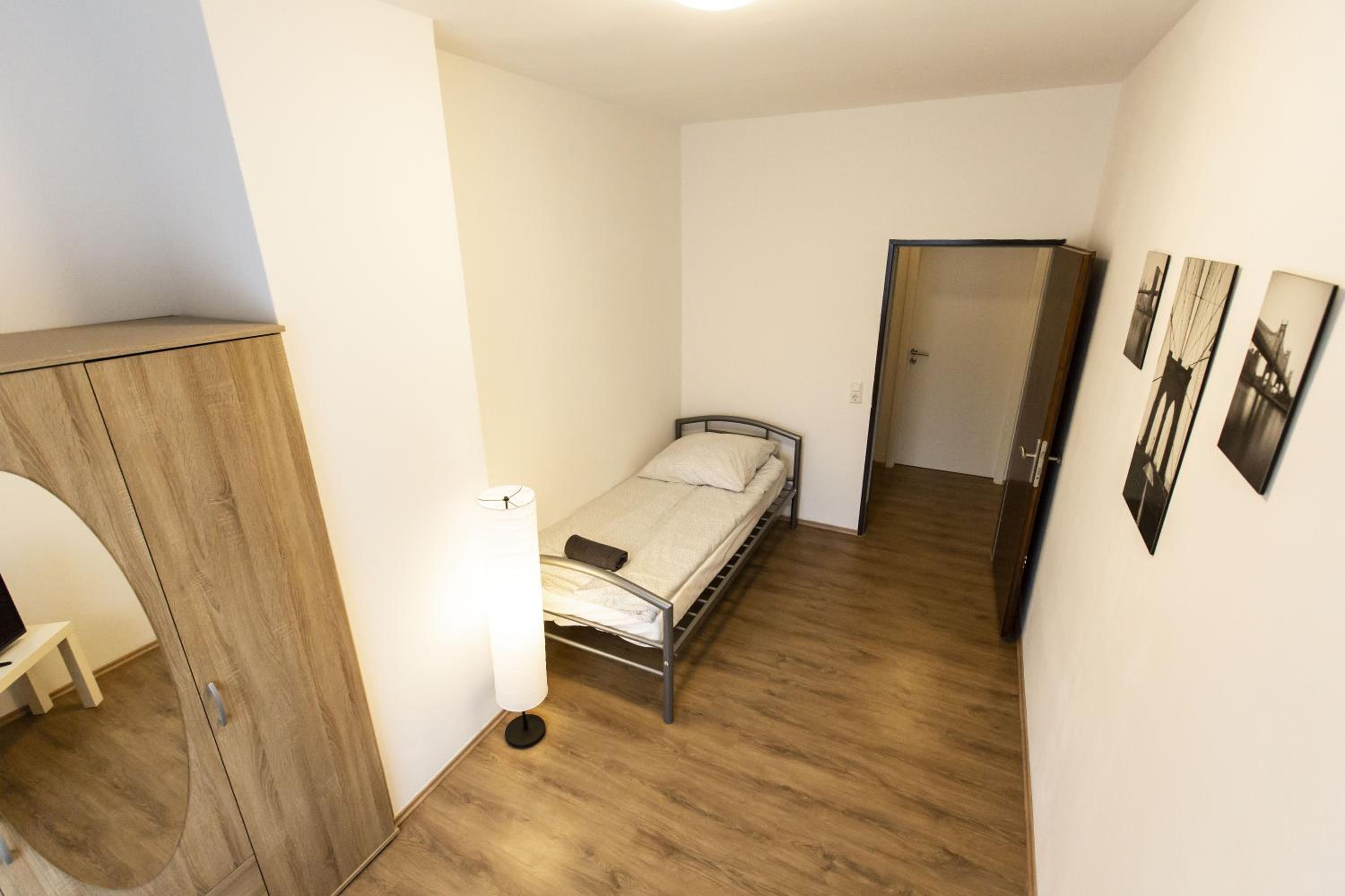 Three-Bedroom Apartment - Photo 17