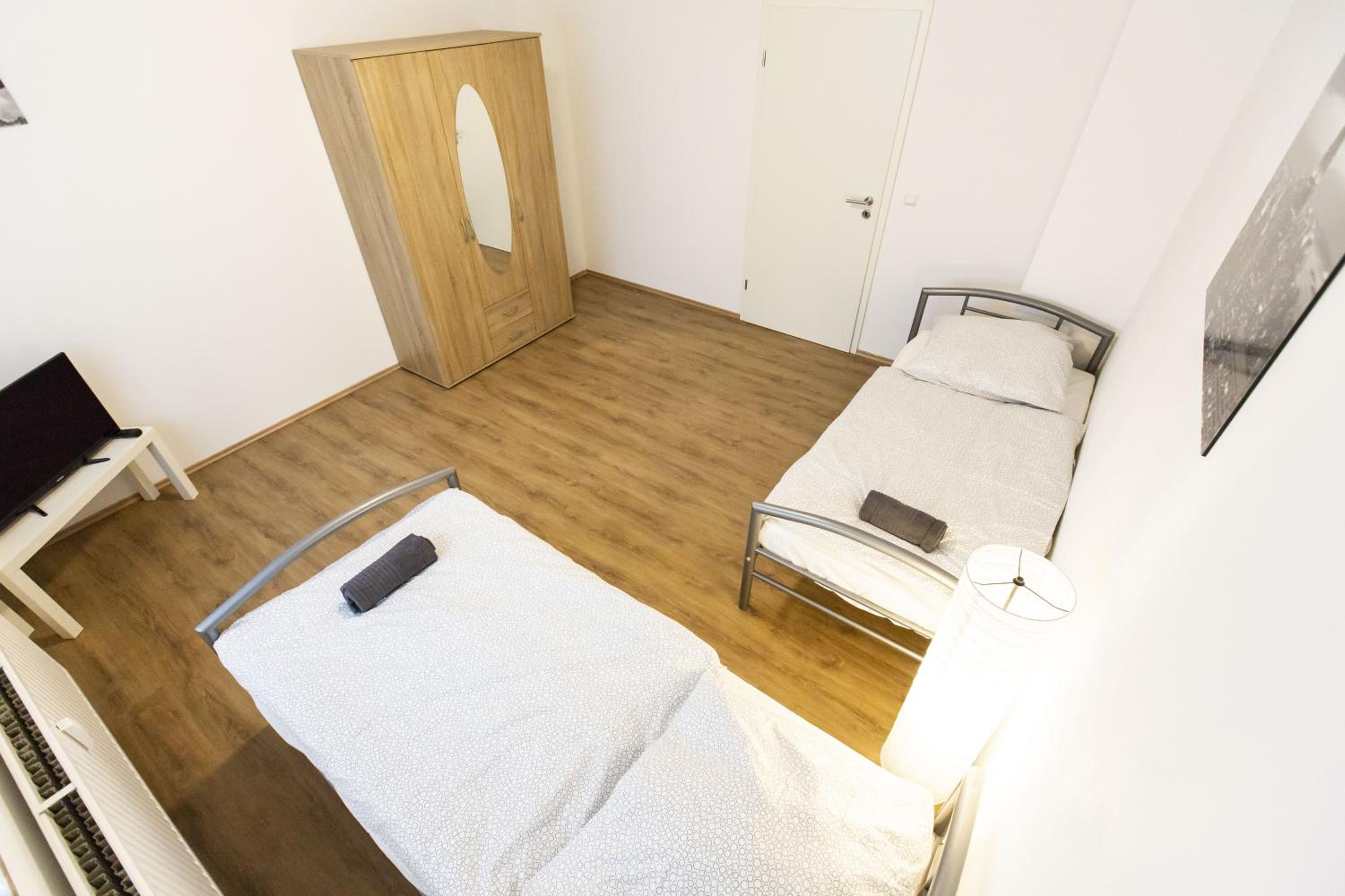 Three-Bedroom Apartment - Photo 20